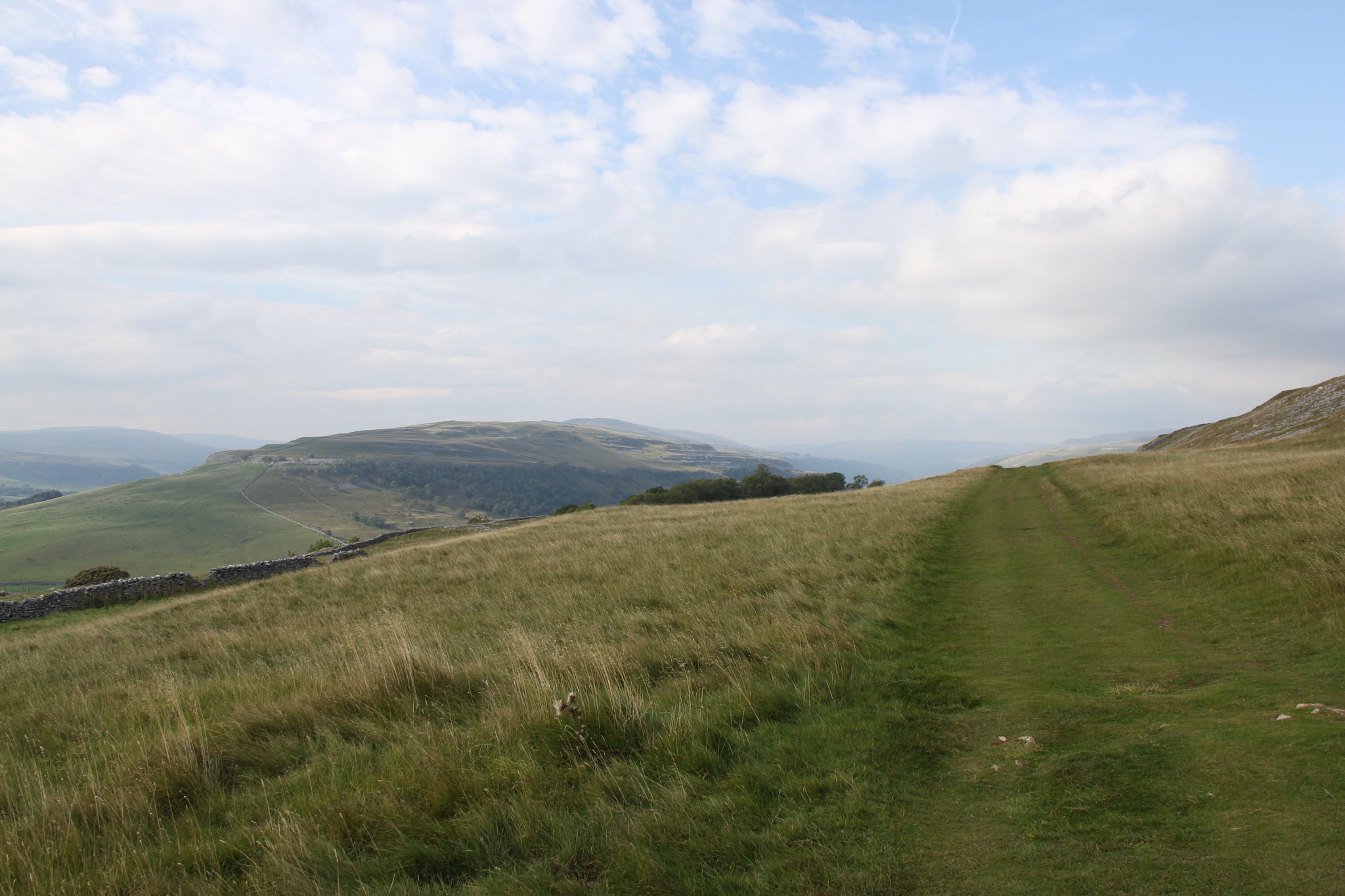 Canon EF-S 18-200mm F3.5-5.6 IS sample photo. A path in the hills photography