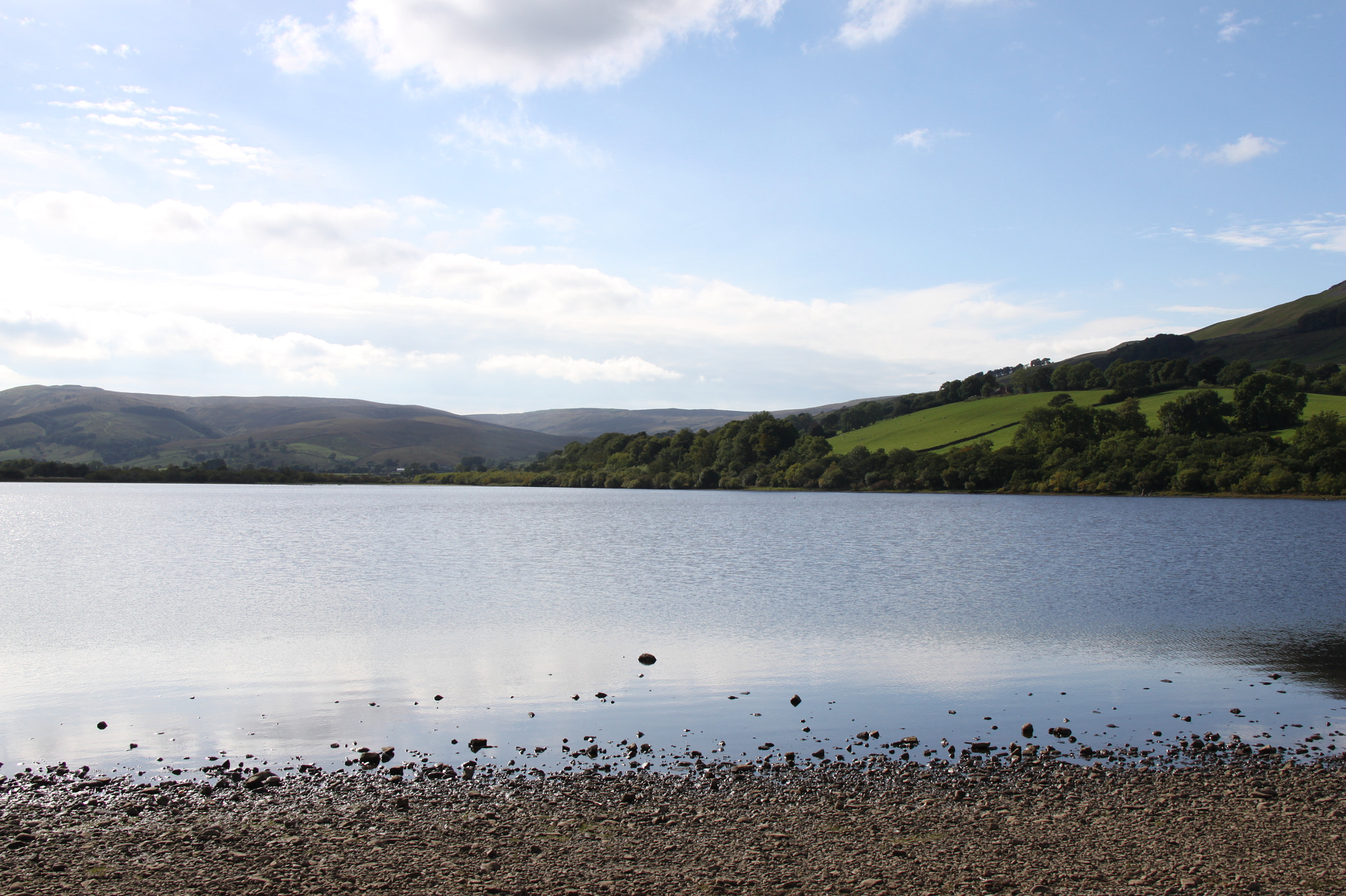 Canon EF-S 18-200mm F3.5-5.6 IS sample photo. Hills around a lake photography