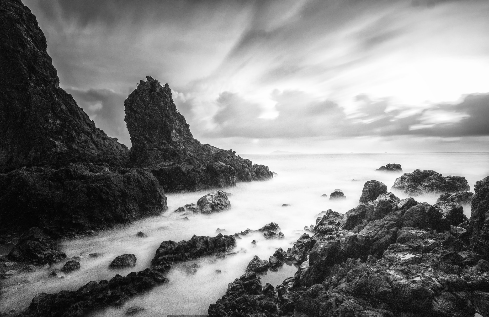 20mm F2.8 sample photo. Black and white photo. smooth dawning at the coast of island in johor photography