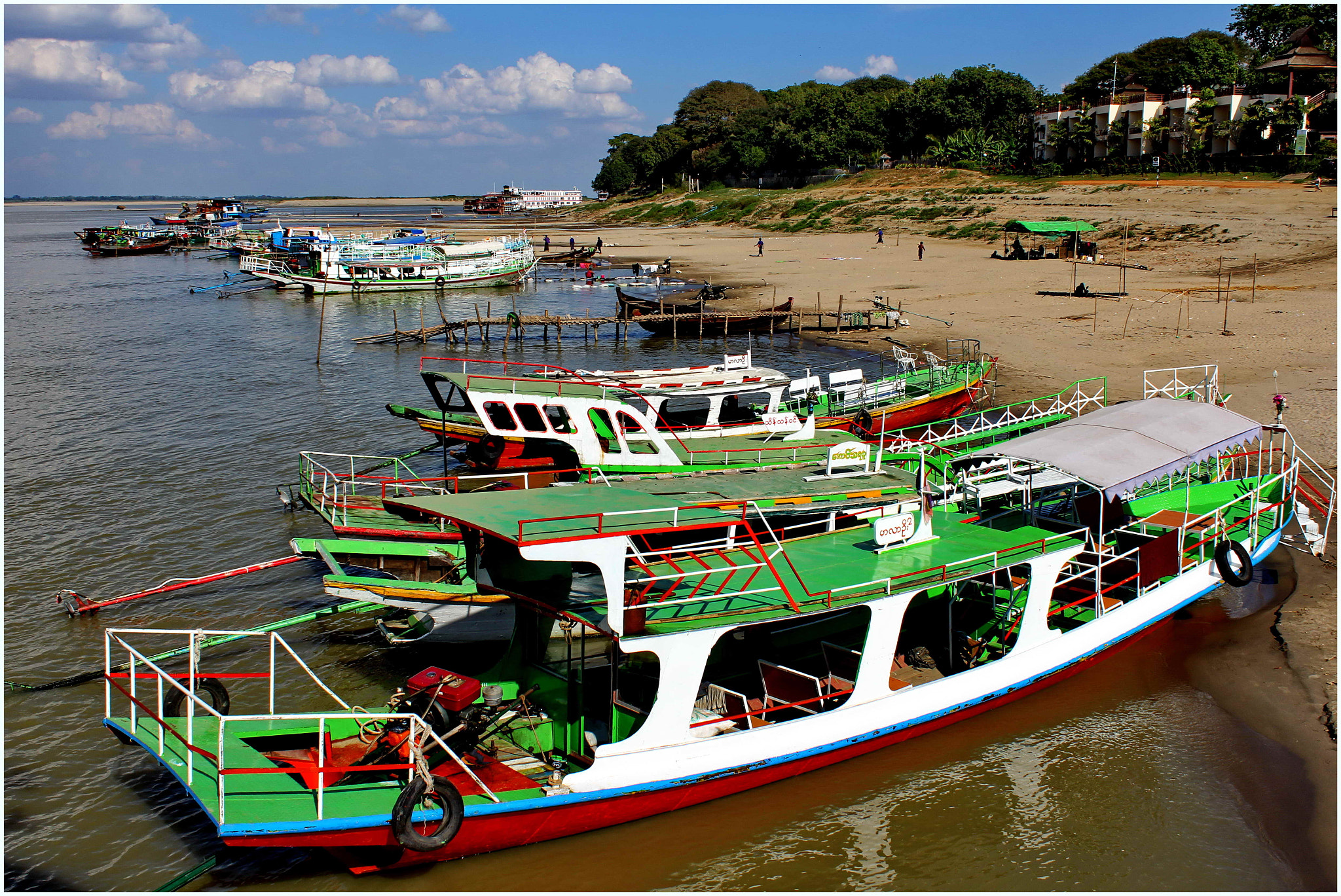 Canon EF-S 18-55mm F3.5-5.6 IS sample photo. Bagan tourist boats waiting for sunset photography