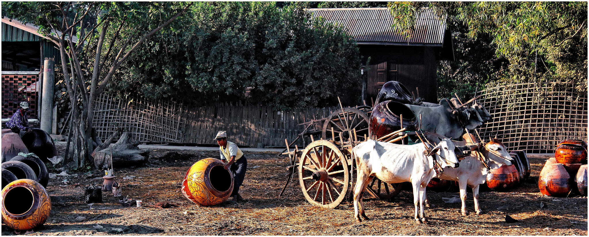 Canon EF-S 18-55mm F3.5-5.6 IS sample photo. Kyauk myoung delivering pots for transport downstr photography