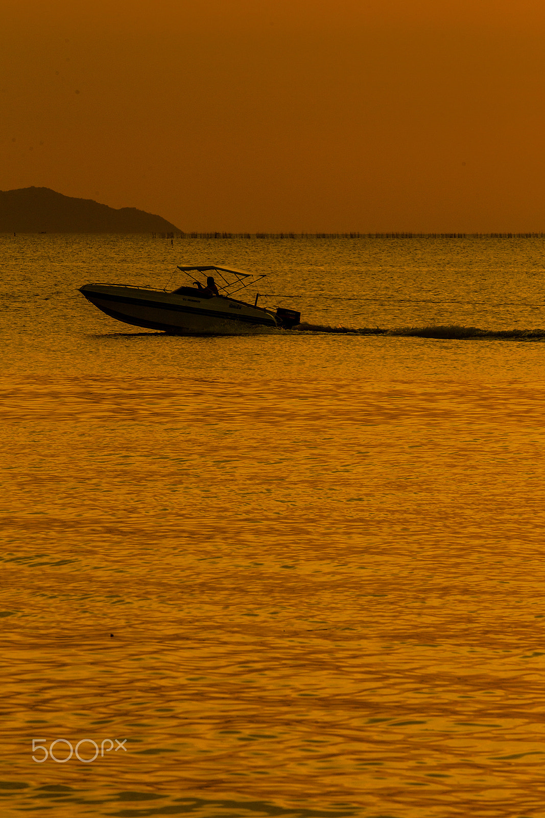 Canon EOS-1D Mark IV + Canon EF 80-200mm f/2.8L sample photo. Boat on sea sunset photography