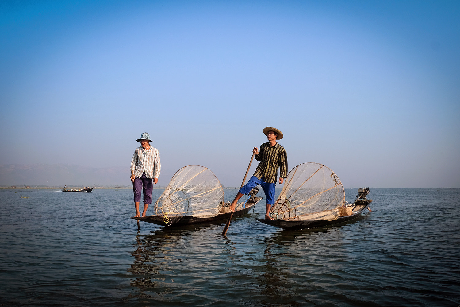 Fujifilm X-E2 + Fujifilm XF 18-55mm F2.8-4 R LM OIS sample photo. Real fishermen of inle photography