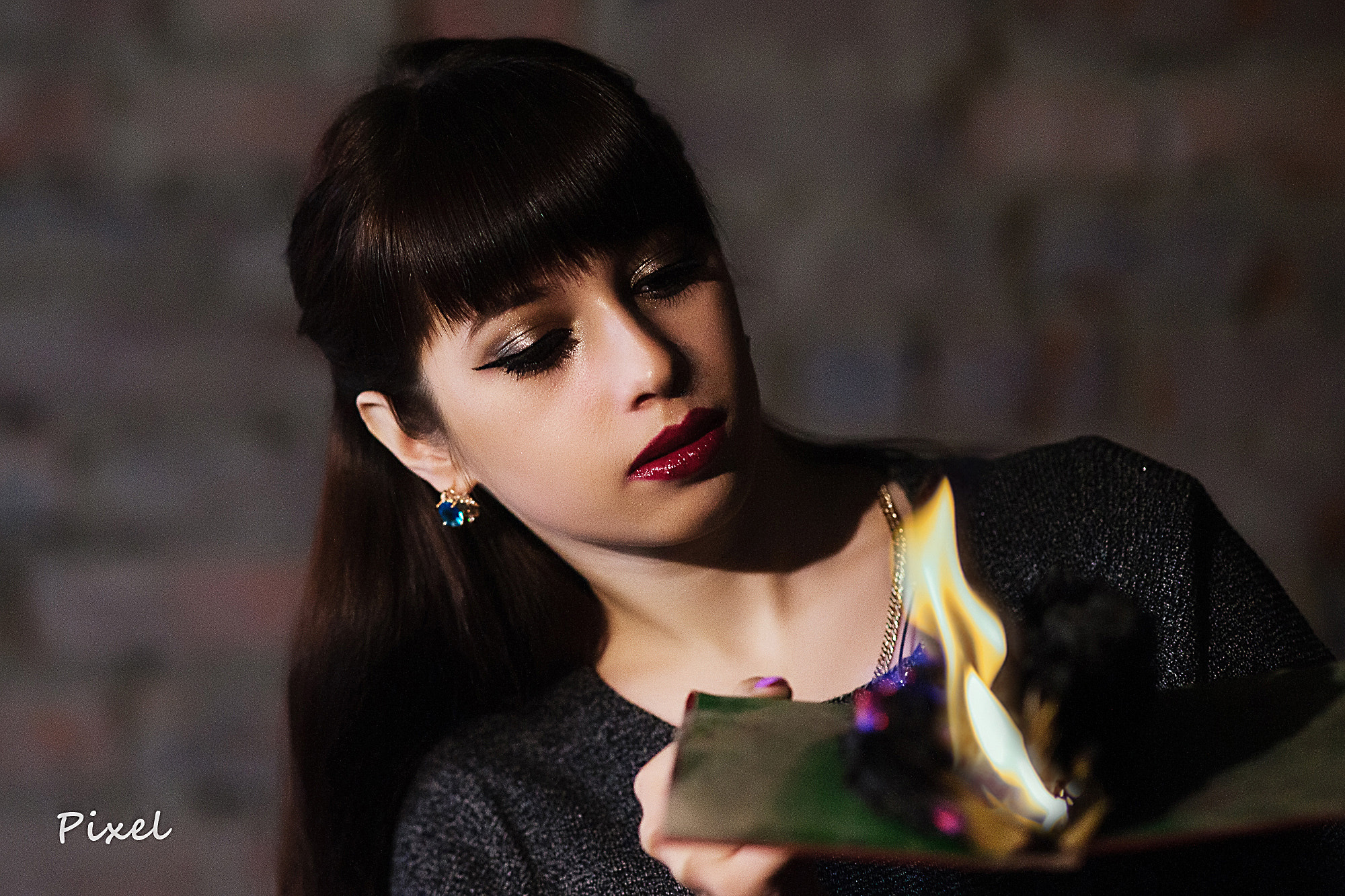 Sony Sonnar T* 135mm F1.8 ZA sample photo. Portrait with burning book photography
