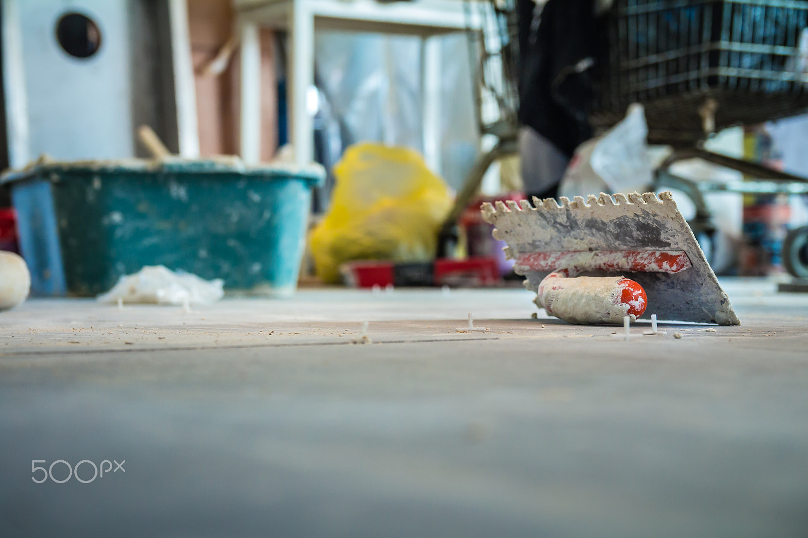 Canon EOS 650D (EOS Rebel T4i / EOS Kiss X6i) sample photo. Trowel on the floor in construction site photography
