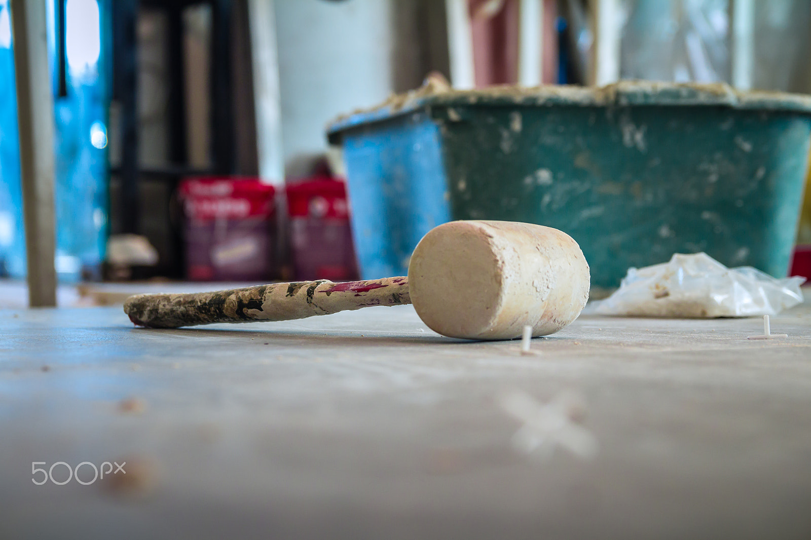 Canon EOS 650D (EOS Rebel T4i / EOS Kiss X6i) sample photo. Wooden hammer on the floor in construction site photography