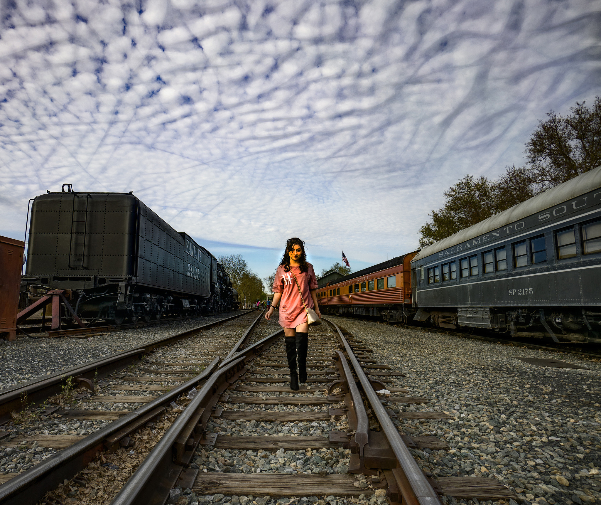 Sony a7 + Sony E 10-18mm F4 OSS sample photo. Girl on tracks photography