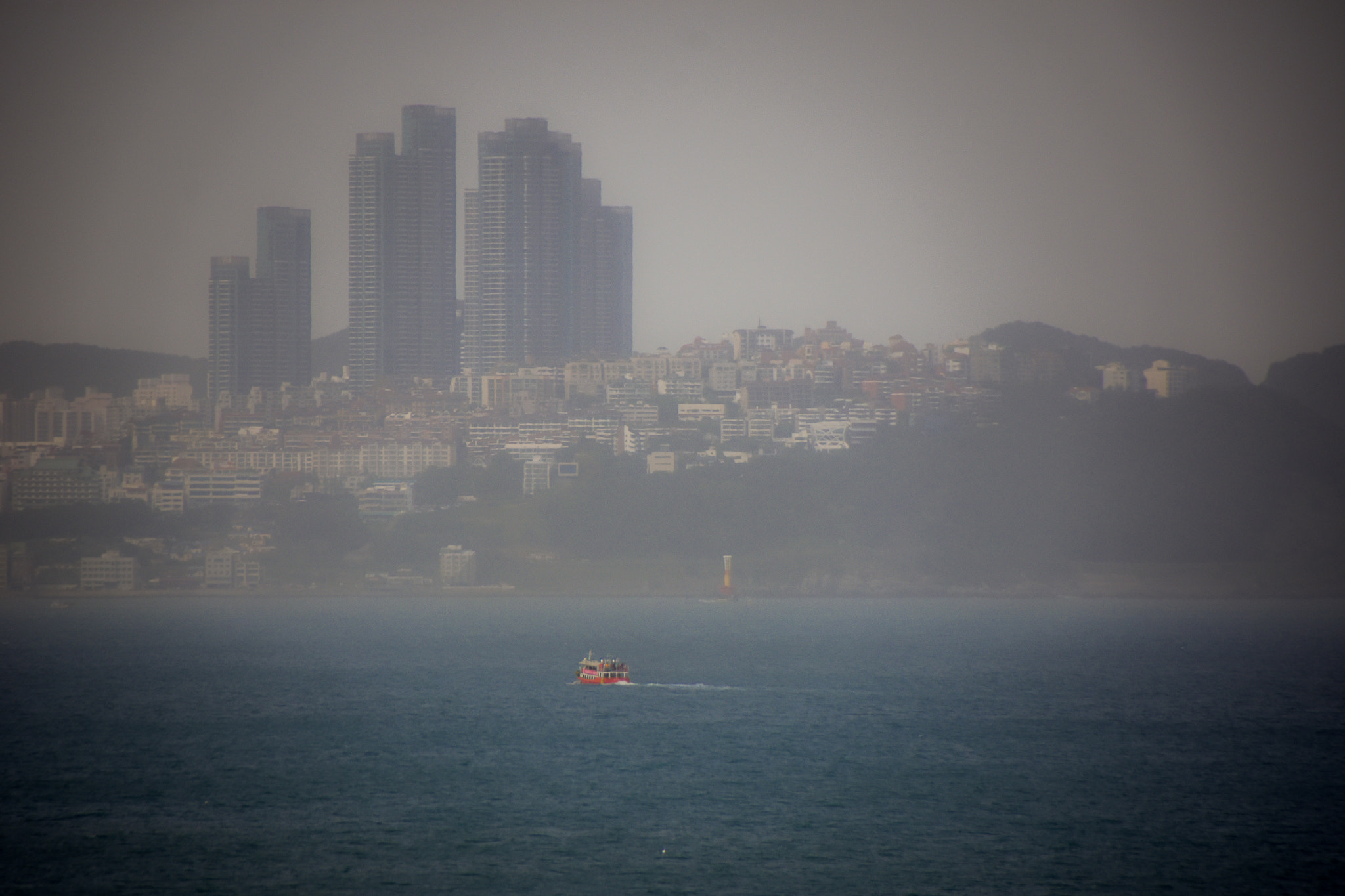 Sigma 18-250mm F3.5-6.3 DC Macro OS HSM sample photo. Boat on the sea photography