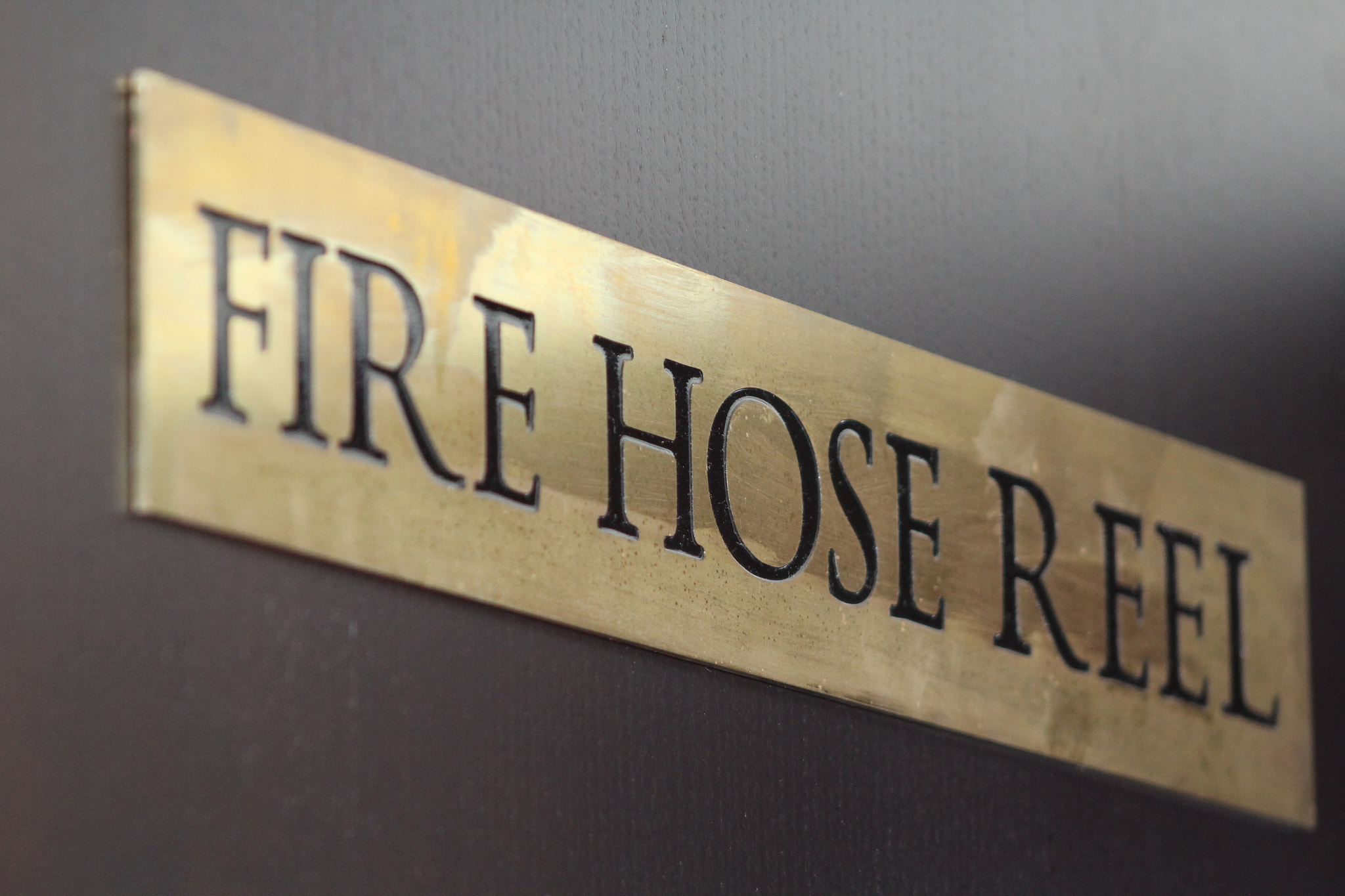 Canon EF 75-300mm f/4-5.6 USM sample photo. Fire hose reel photography