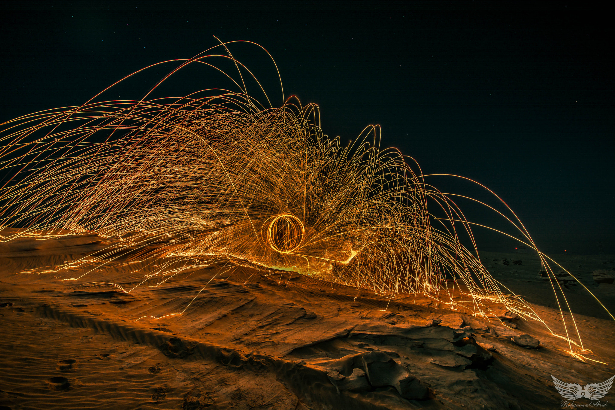 Sigma 10-20mm F4-5.6 EX DC HSM sample photo. Steelwool woth rocks photography