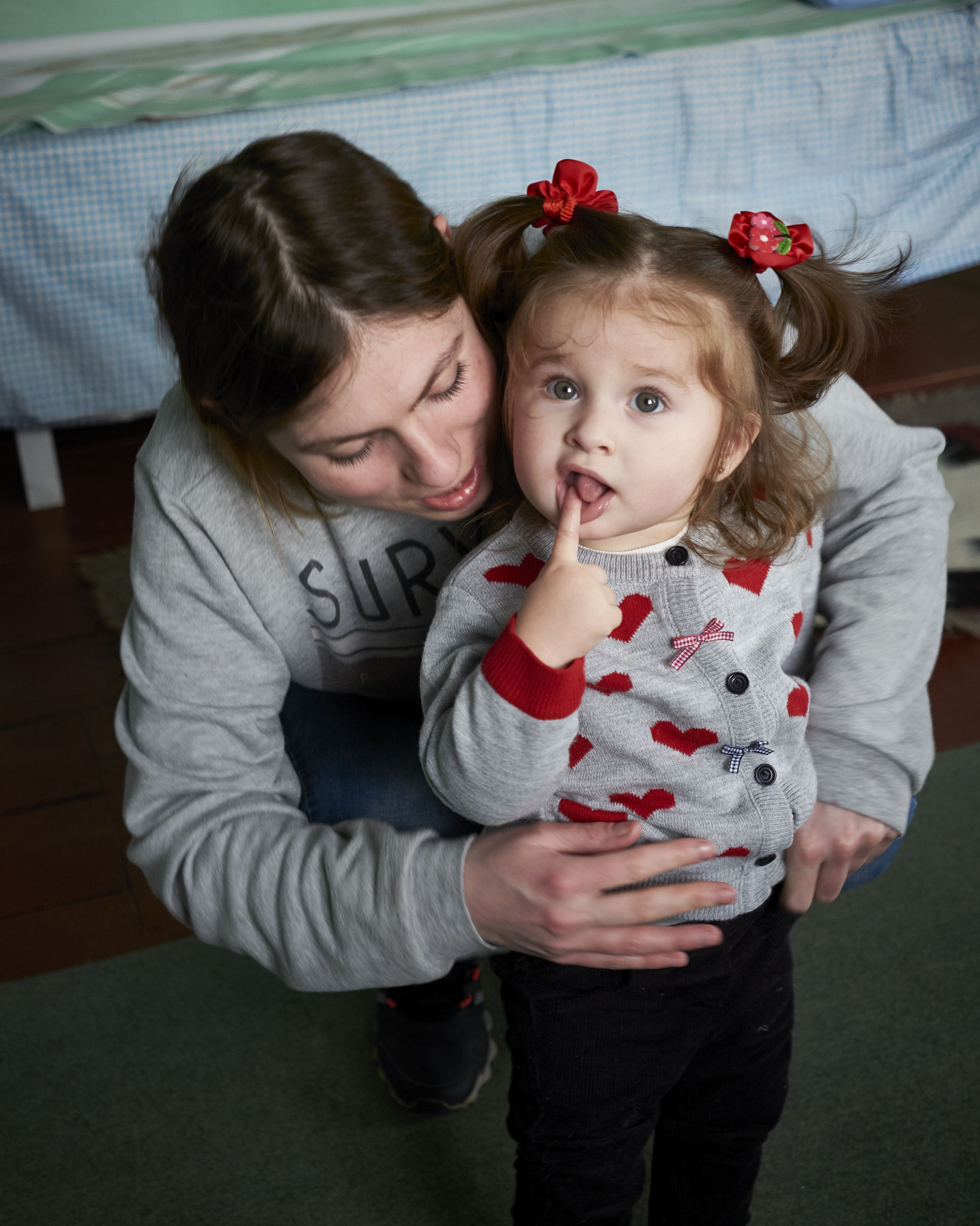 Fujifilm X-M1 + Fujifilm XF 27mm F2.8 sample photo. Mommys arms photography