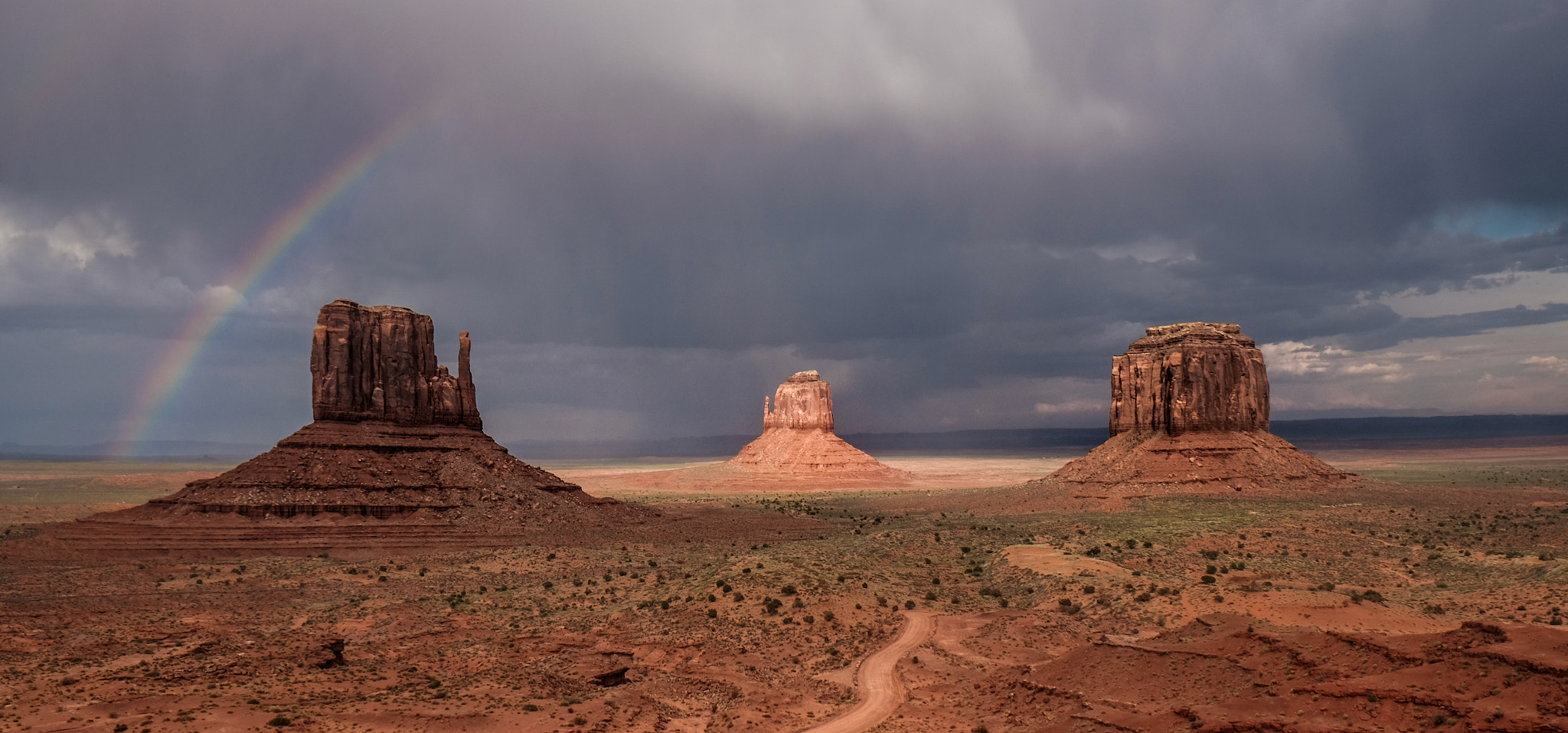 Fujifilm X-E2 + Fujifilm XF 18-55mm F2.8-4 R LM OIS sample photo. Monument valley with rainbow photography
