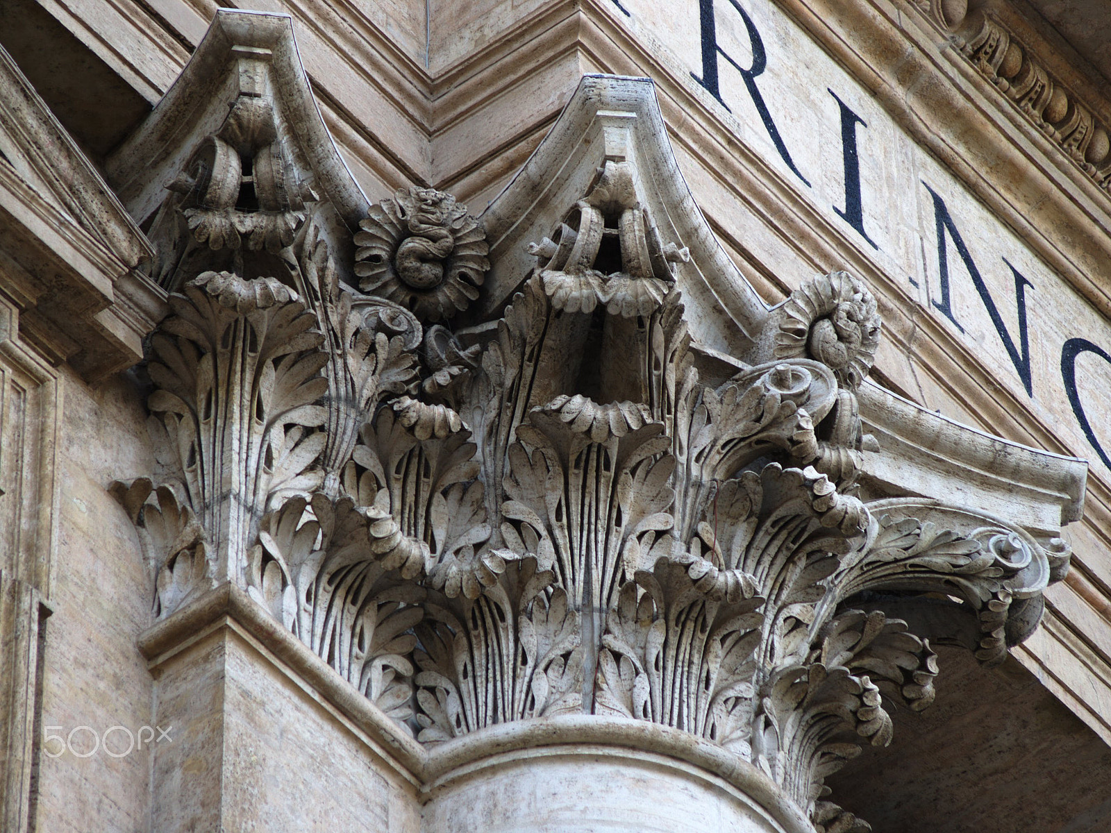 Pentax K100D Super sample photo. Capitals on st. peter's basilica photography