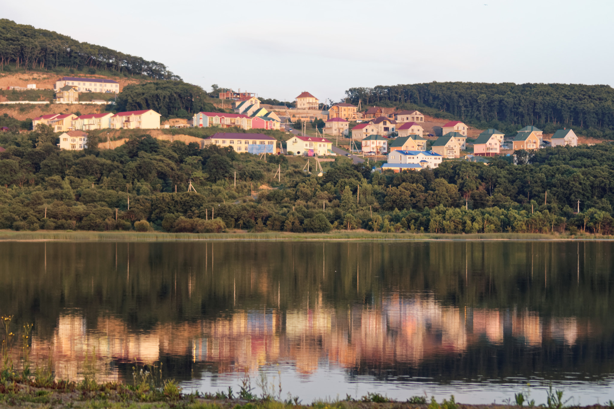 Sony 75-300mm F4.5-5.6 sample photo. Village near lake photography