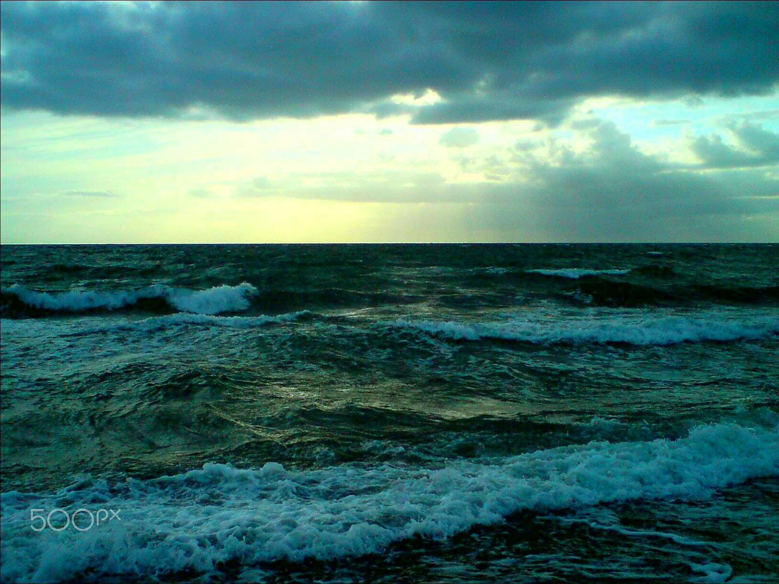 Sony Ericsson C510 sample photo. Dark waves gleaming photography