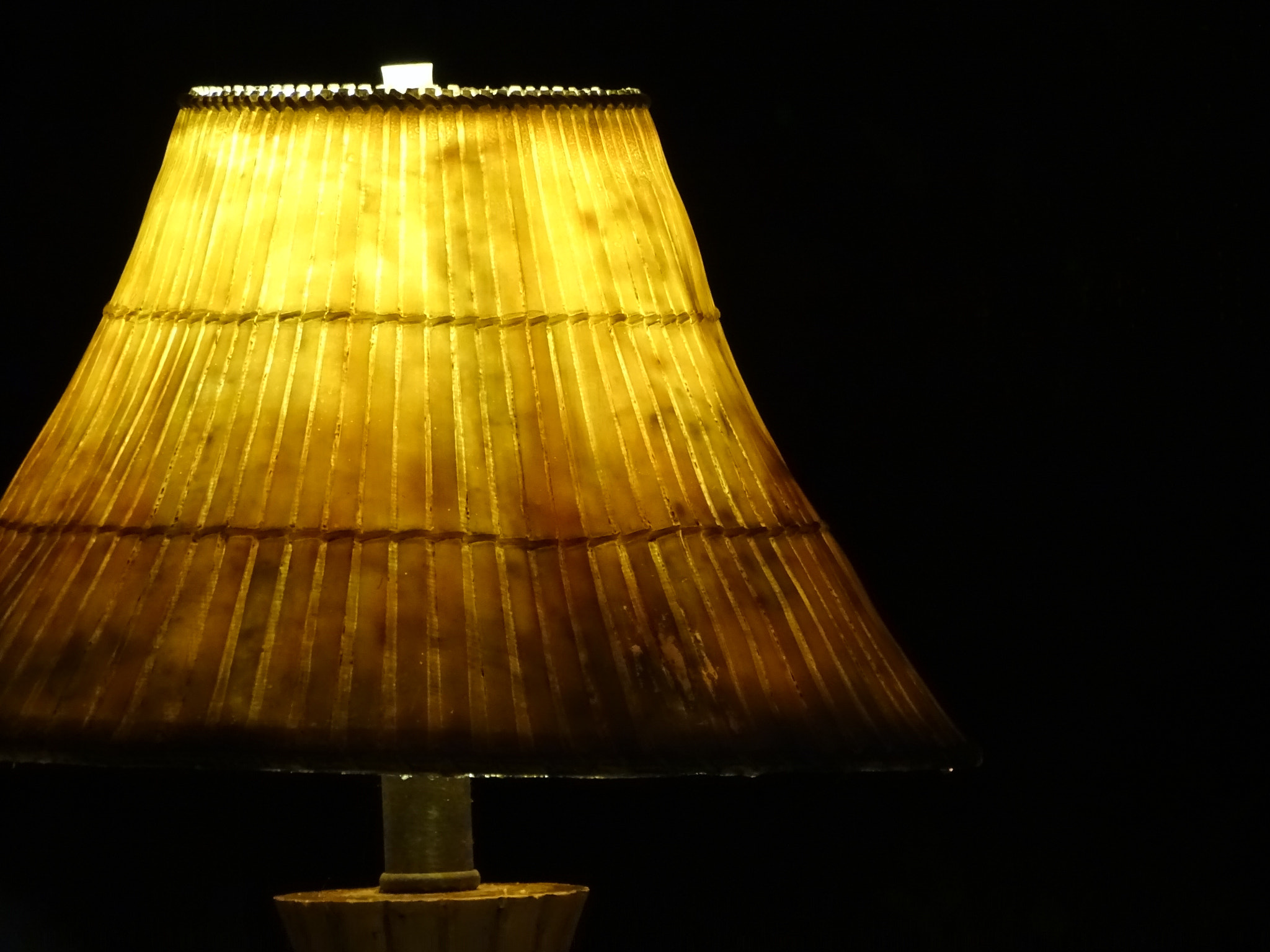 Sony 24-210mm F2.8-6.3 sample photo. Tiki lamp at night photography