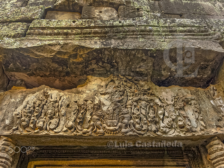 Panasonic Lumix DMC-GF1 + Panasonic Lumix G Vario 7-14mm F4 ASPH sample photo. Lintel of a temple ruins. ta prohm. angkor. cambodia photography