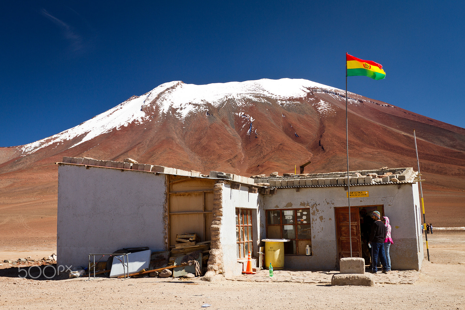 Canon EF 16-35mm F2.8L II USM sample photo. Small house, bolivia flag over mountain background photography