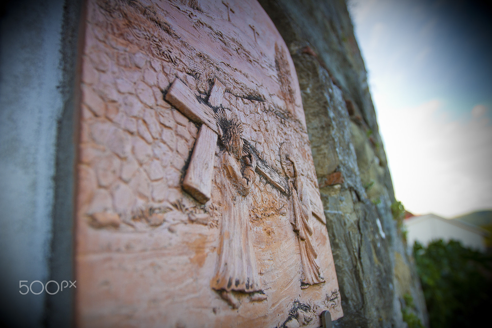 Canon EF 16-35mm F2.8L II USM sample photo. Stone carving of christ carrying the cross photography