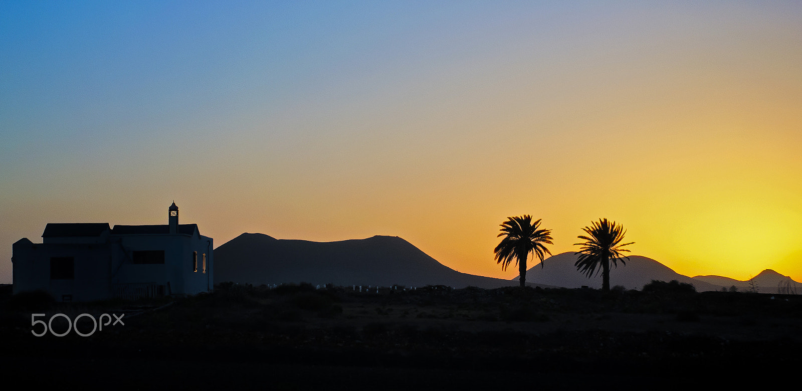 Nikon D90 sample photo. Sunset w calima above volcanoes photography