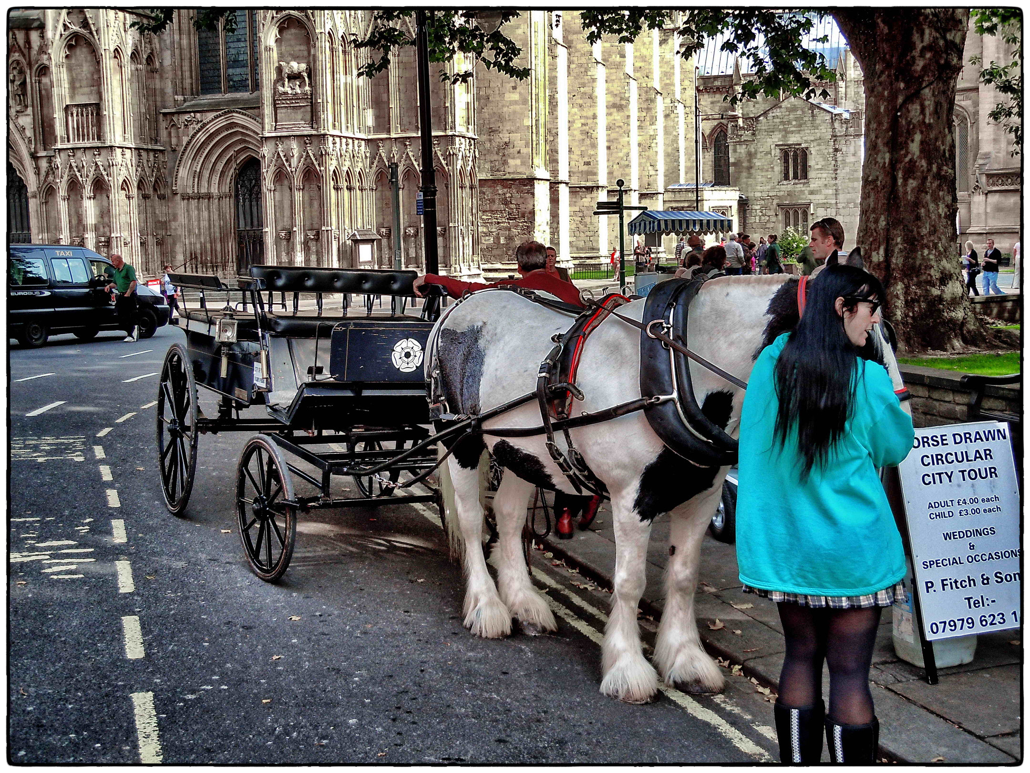 Nikon Coolpix S8000 sample photo. Your chariot awaits. outside the minster photography