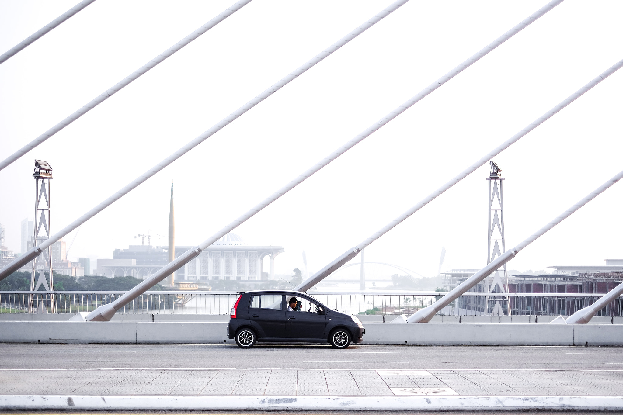 Fujifilm X-M1 + Fujifilm XF 35mm F1.4 R sample photo. A tiny car photography