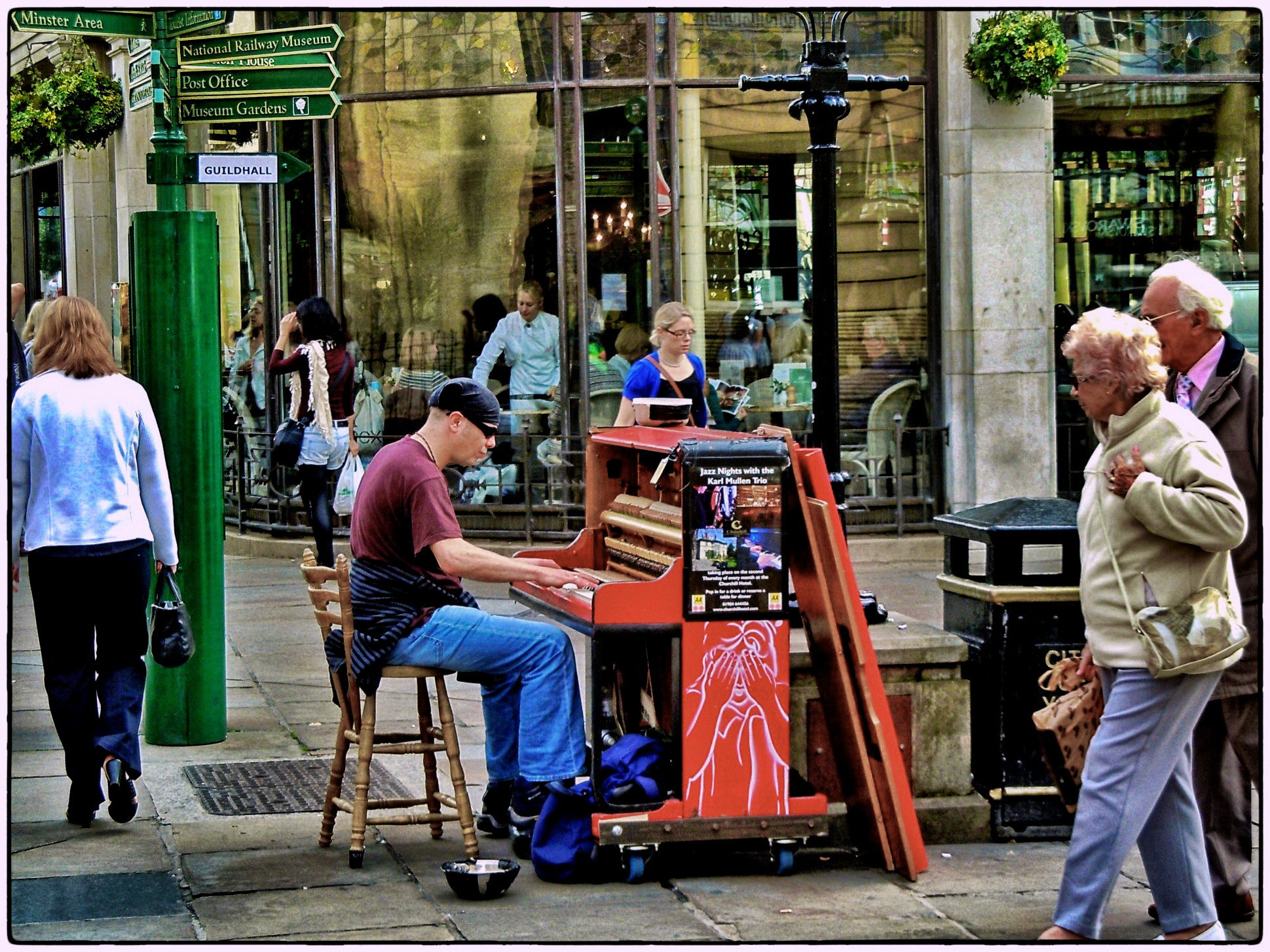 Nikon Coolpix S8000 sample photo. Organ grinder outside betty's photography