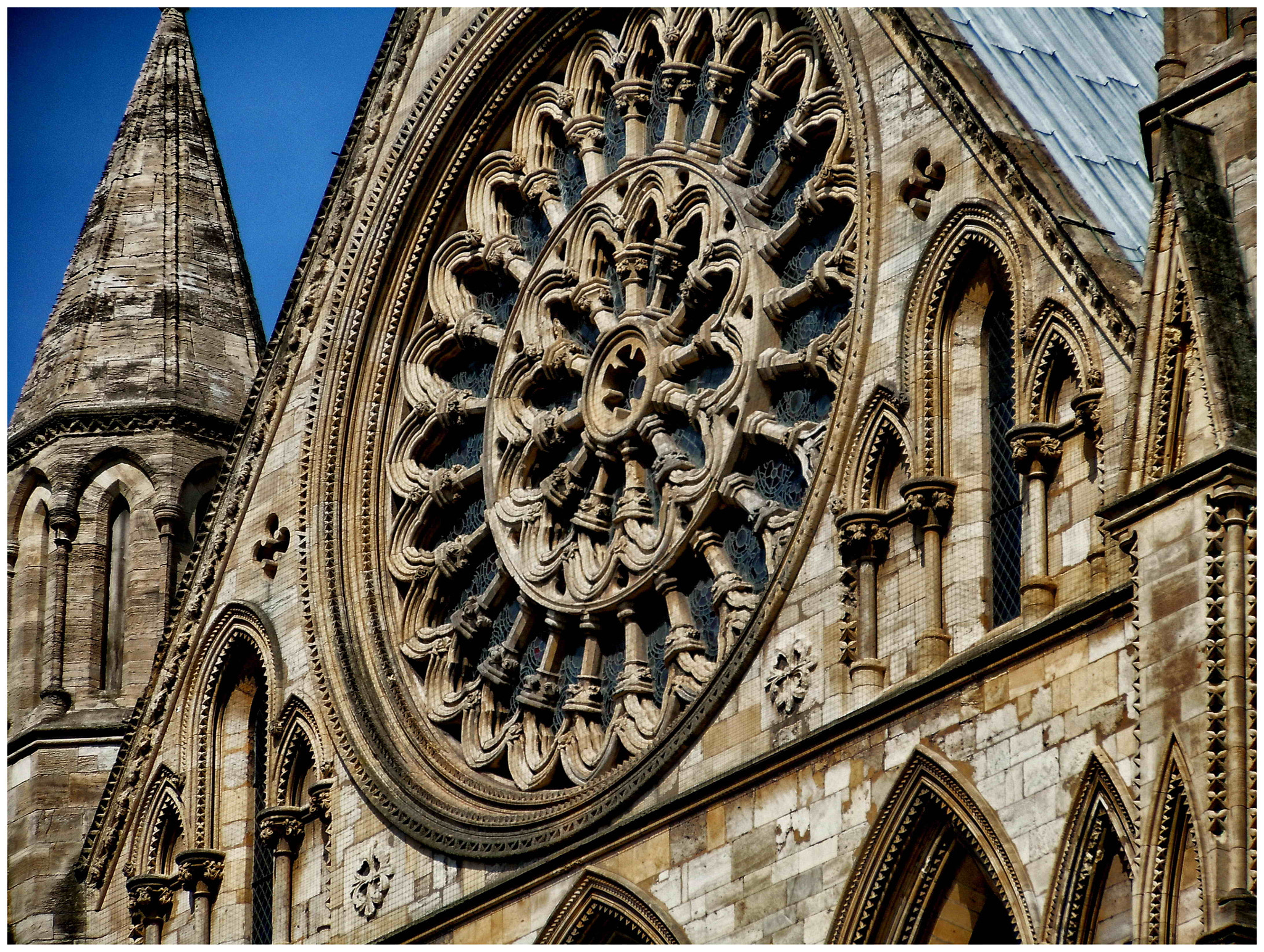 Nikon Coolpix S8000 sample photo. York minster rose window from the outside photography