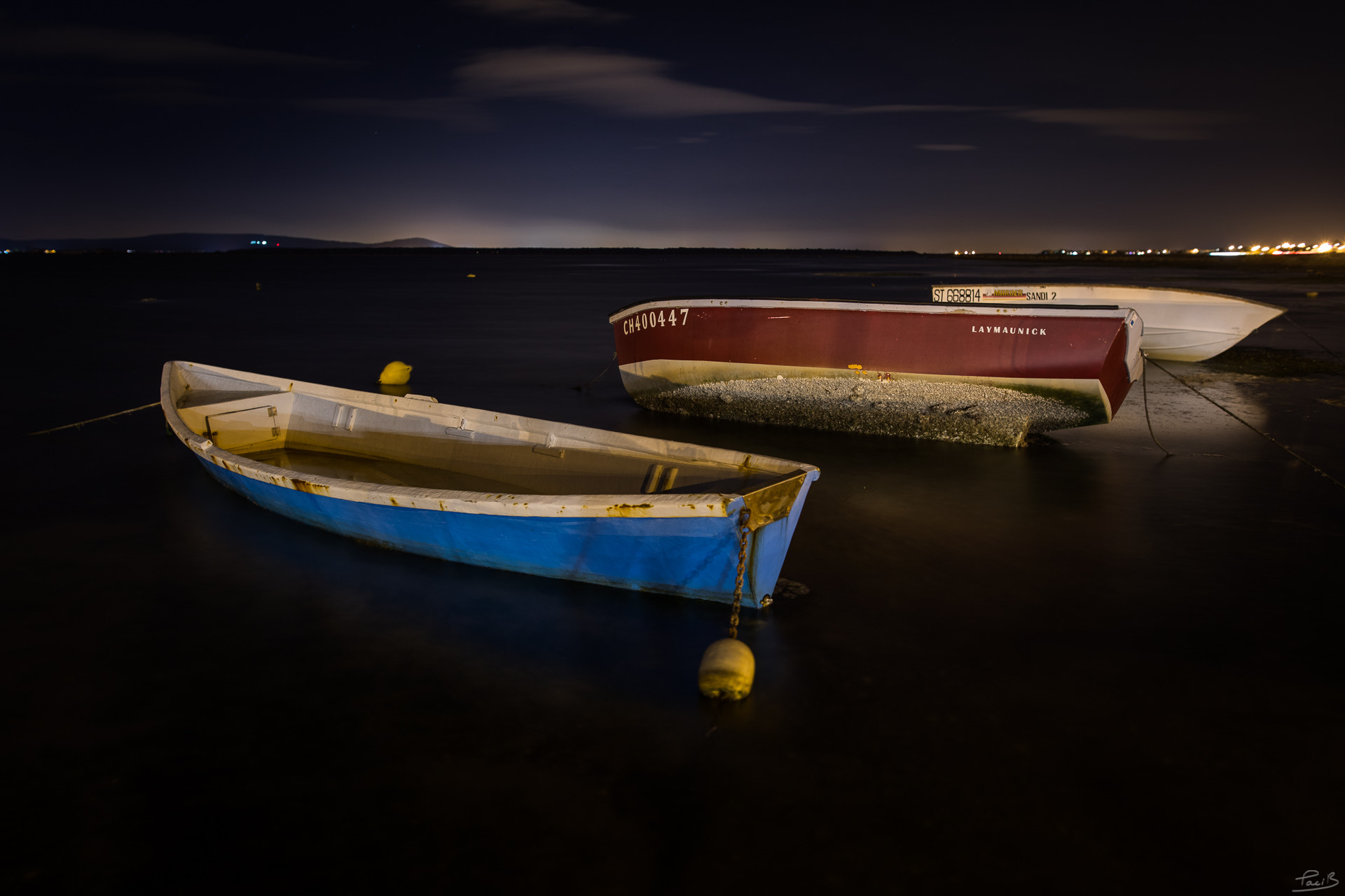 Sigma 24mm F1.4 DG HSM Art sample photo. Row boats waiting for the fishing season photography