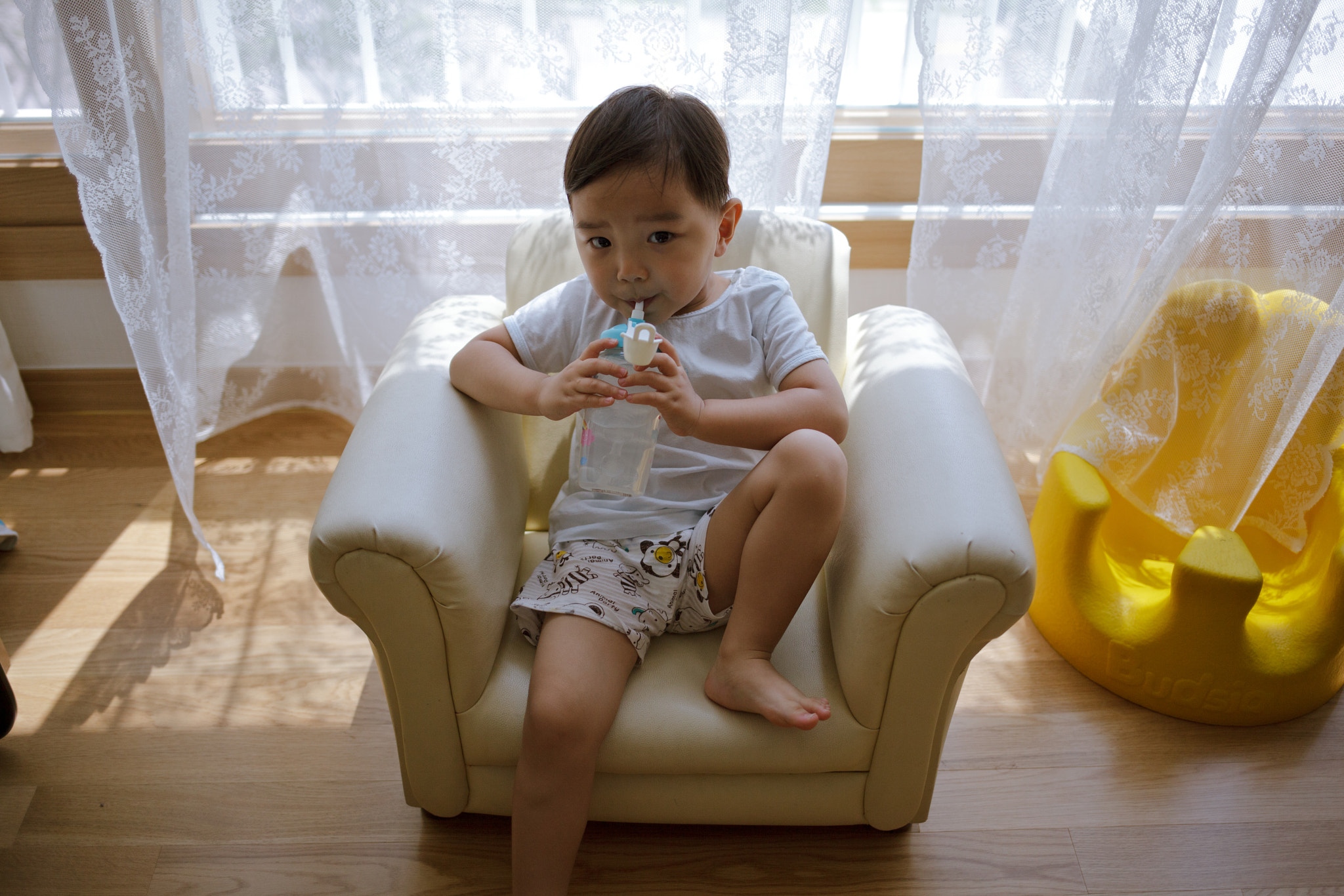 Canon EOS 5D Mark II sample photo. Drinking water with a straw photography