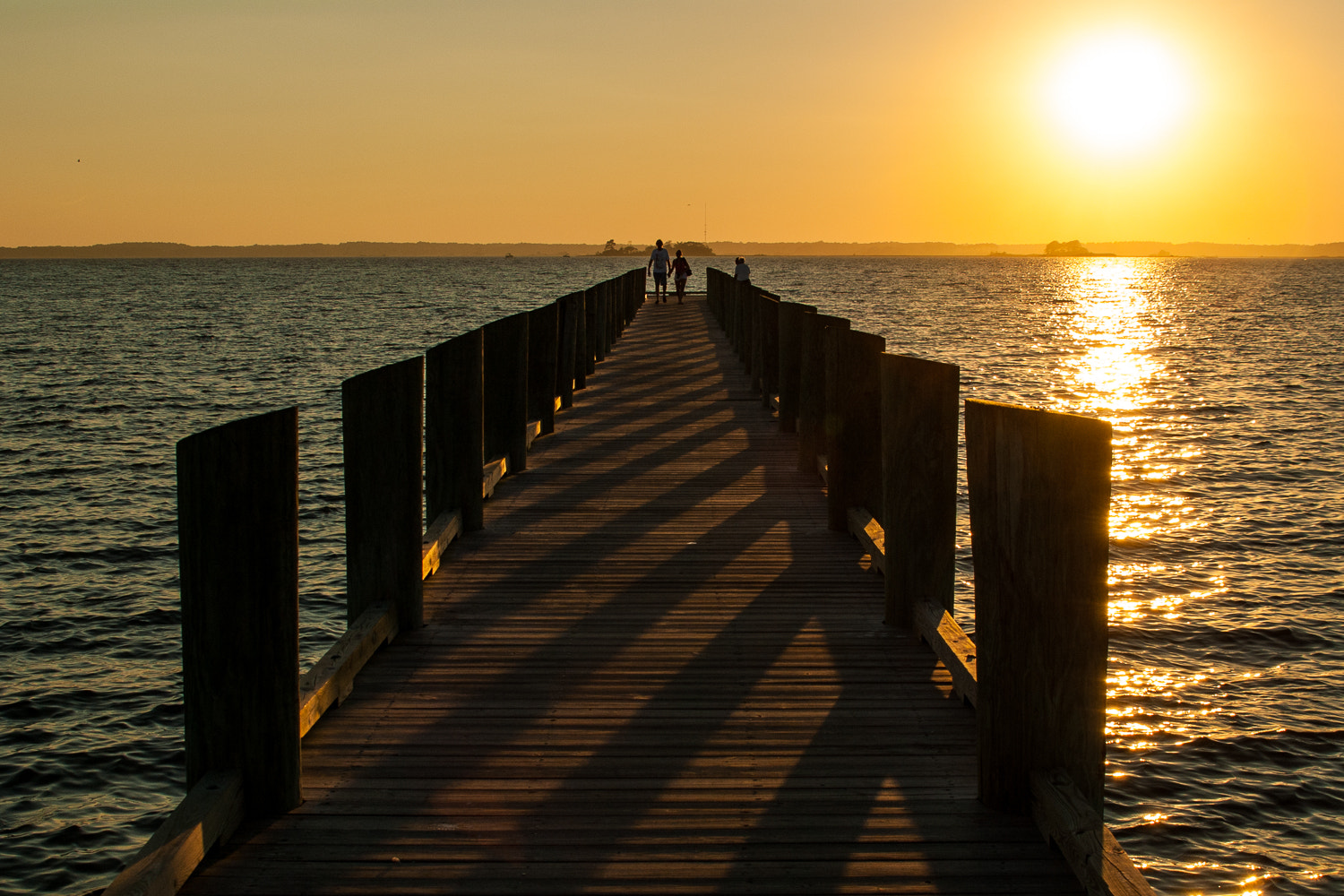 Nikon D200 sample photo. Walking the pier at sunset photography