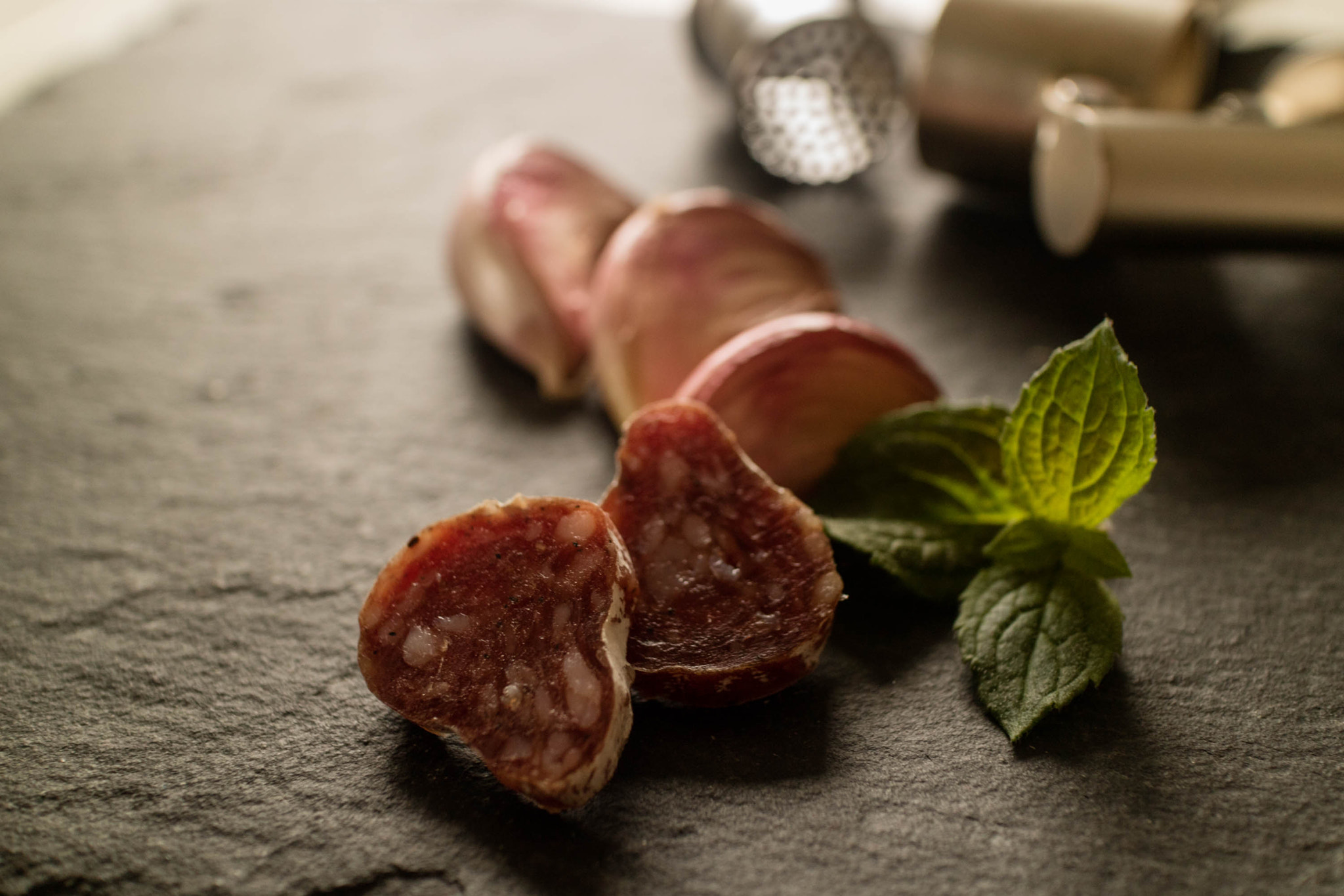 Canon EOS M3 + Canon EF-M 22mm F2 STM sample photo. Salami and garlic photography