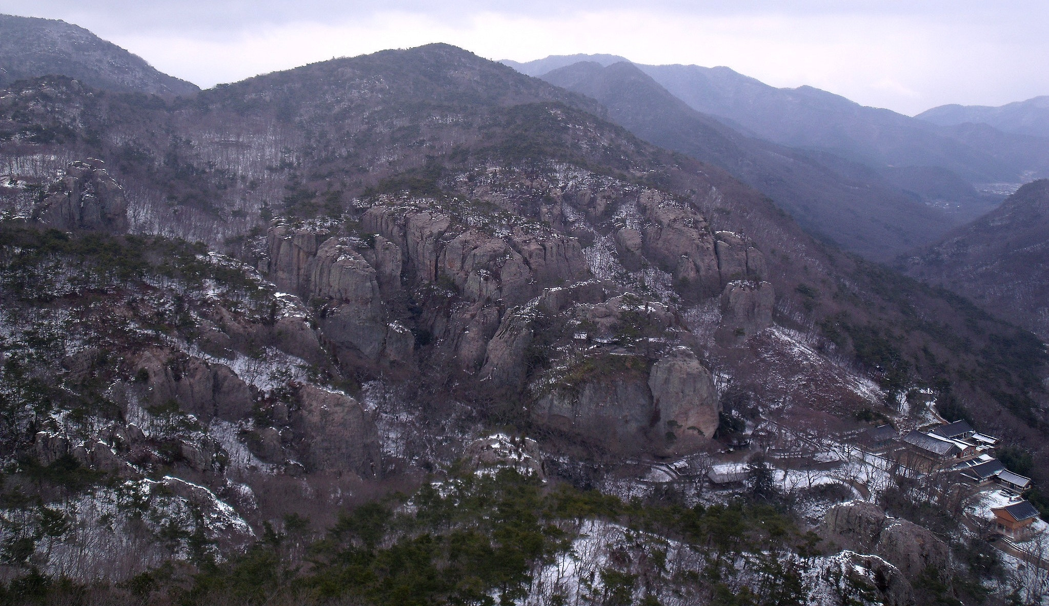 Fujifilm FinePix J110W sample photo. A hermitage surrounded by rock walls photography