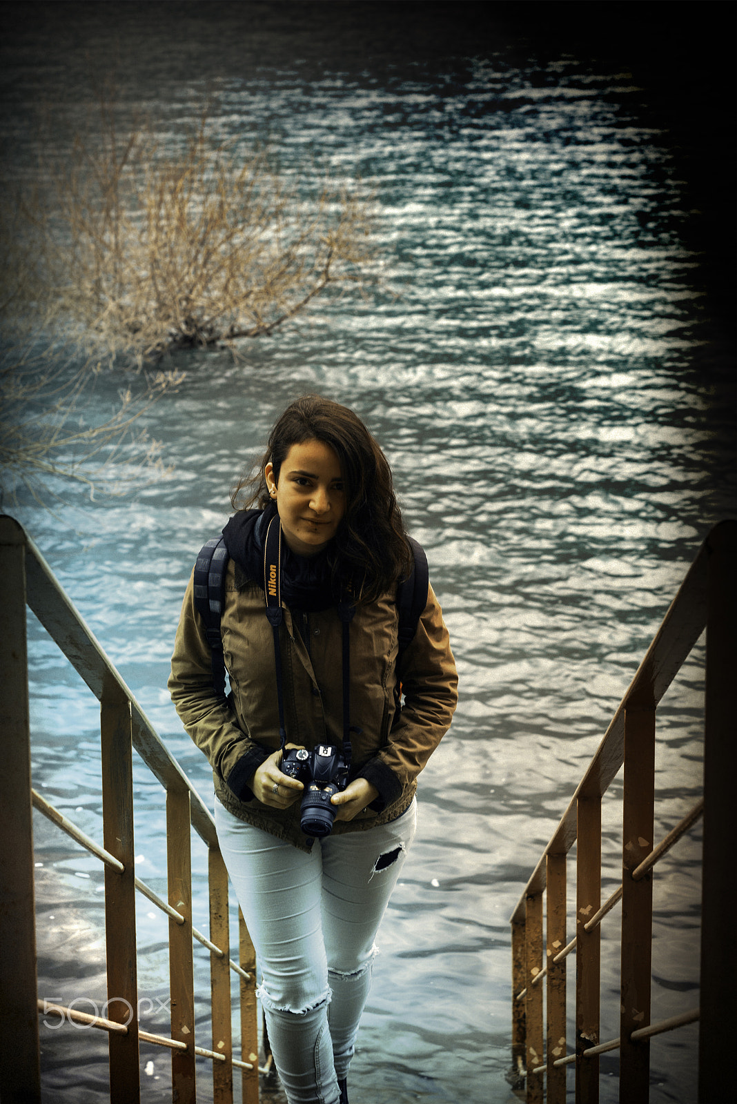Nikon D610 sample photo. Photoshooting of a woman holding her camera. photography