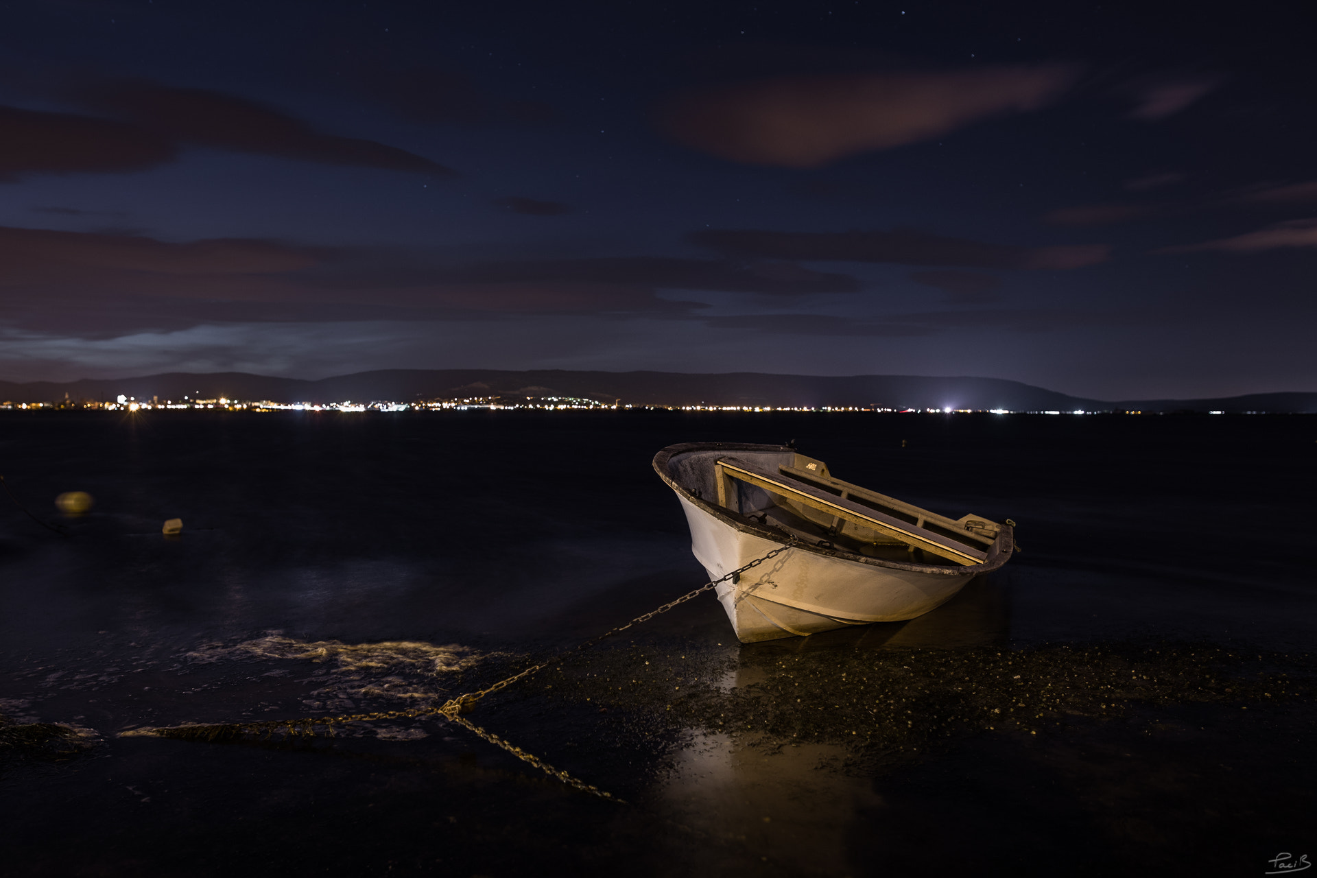 Sigma 24mm F1.4 DG HSM Art sample photo. Grounded row boat photography