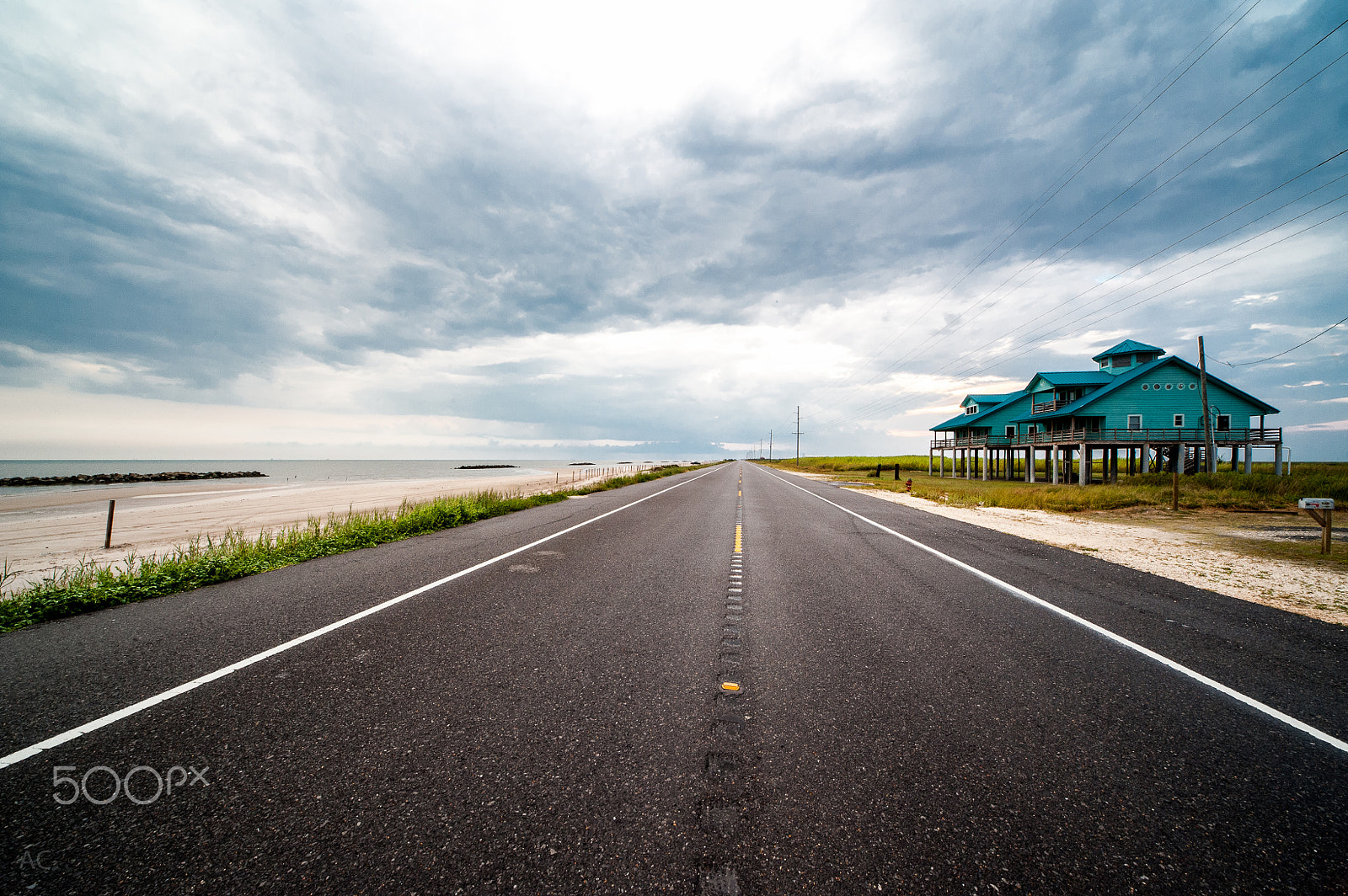 Nikon D700 + Sigma 12-24mm F4.5-5.6 EX DG Aspherical HSM sample photo. House, road, sea, clouds. photography