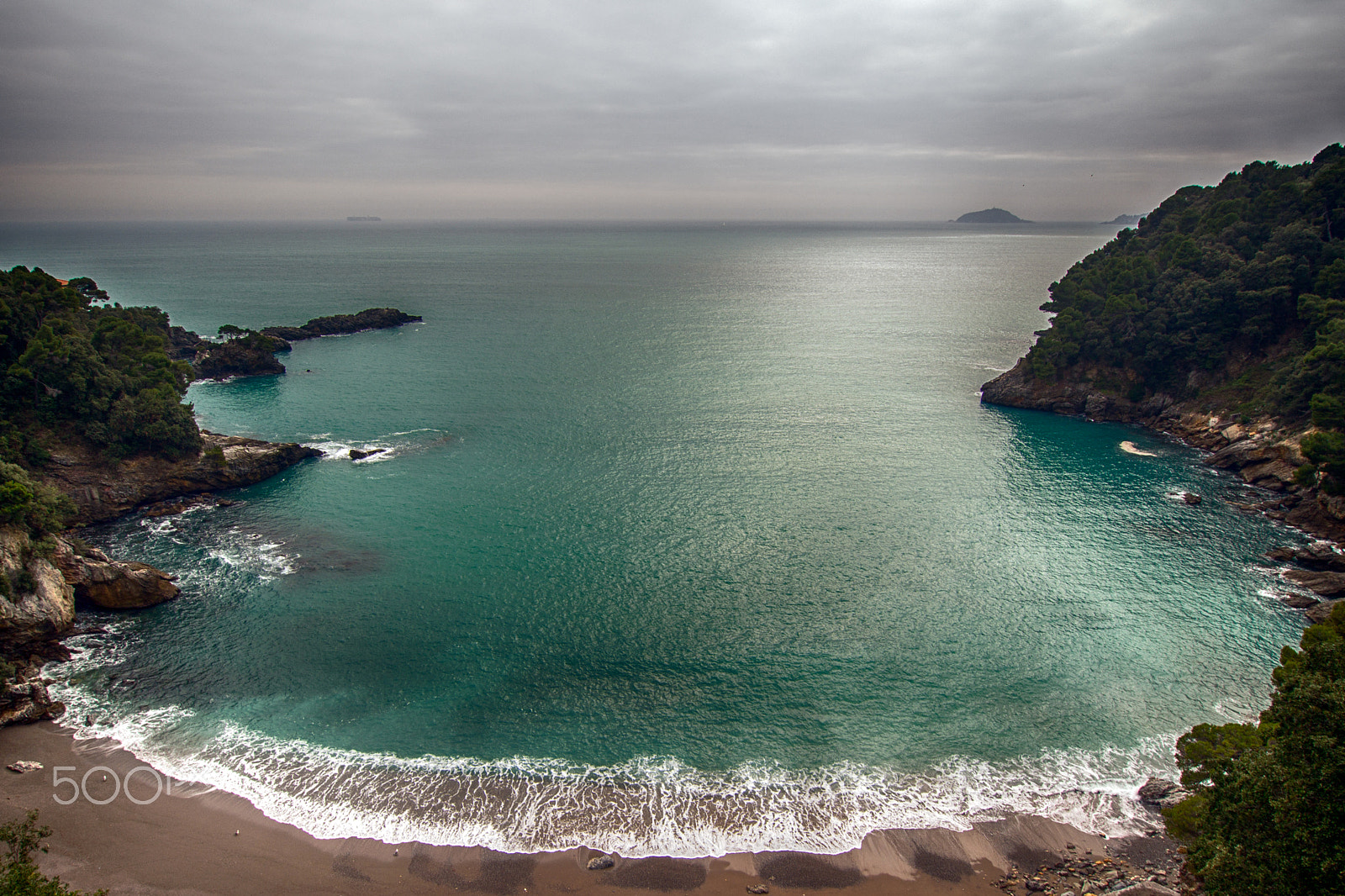 Olympus M.Zuiko Digital ED 9-18mm F4.0-5.6 sample photo. Clouds over poets bay photography