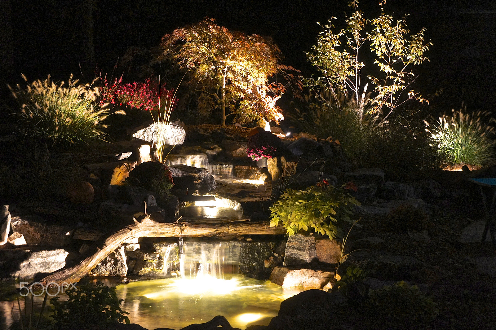 Sony E 18-55mm F3.5-5.6 OSS sample photo. Pond at night under the lights photography