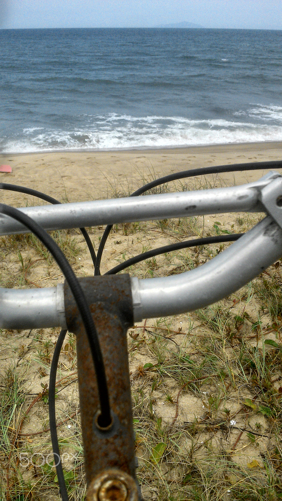 Motorola RAZR i sample photo. Bike and waves photography