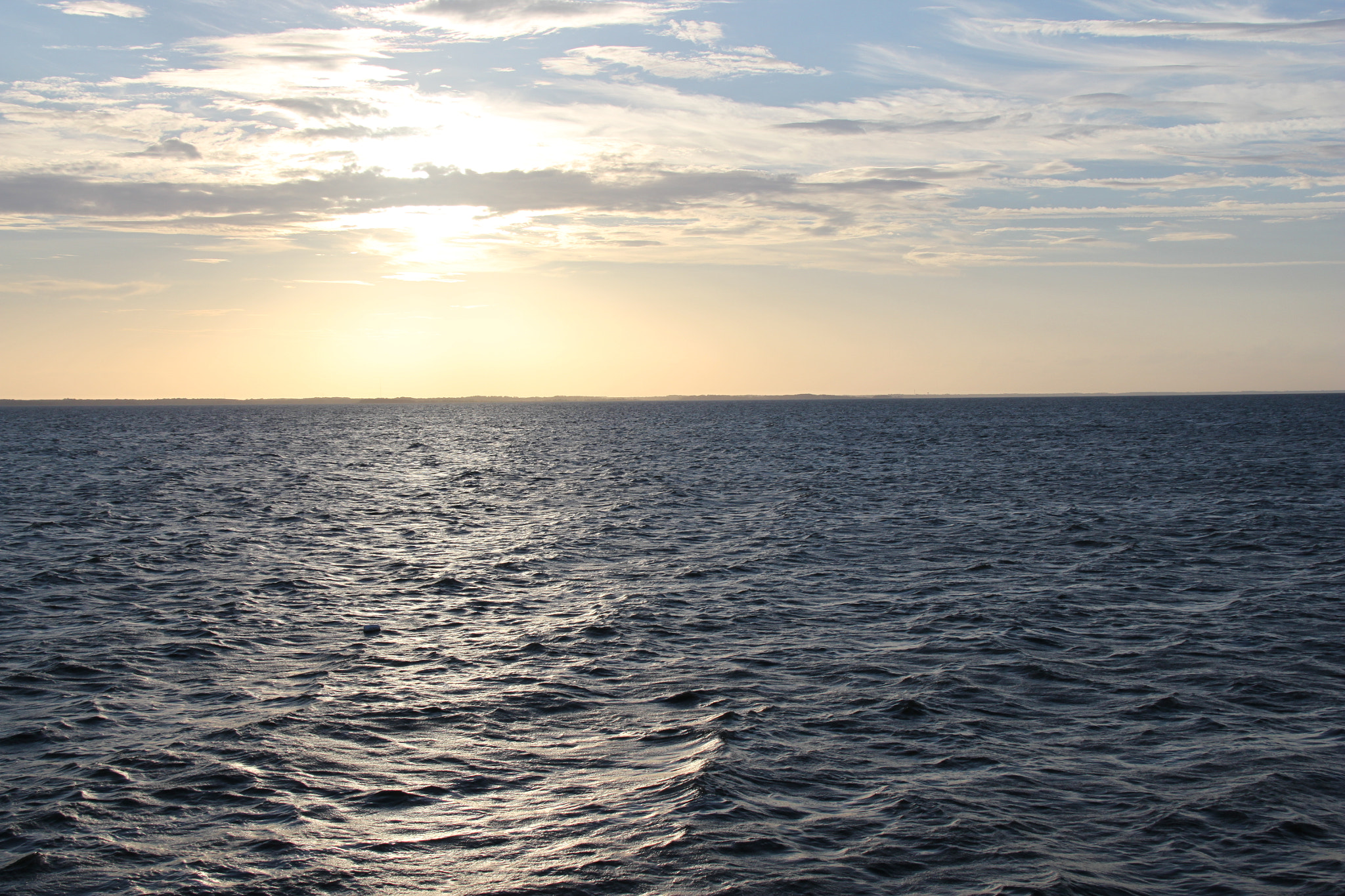 Canon EF-S 18-200mm F3.5-5.6 IS sample photo. Sunset over water photography