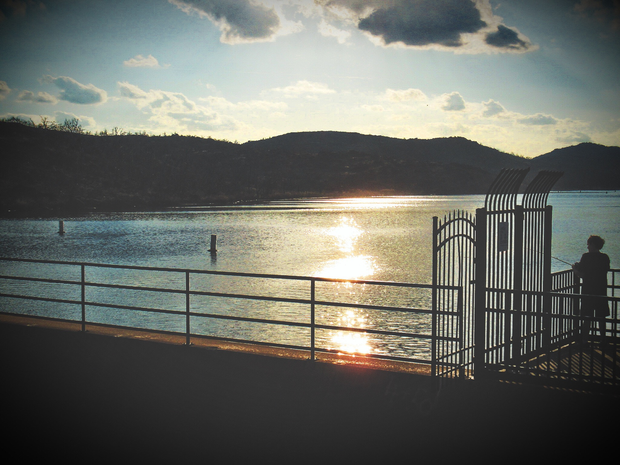 Canon PowerShot ELPH 340 HS (IXUS 265 HS / IXY 630) sample photo. Boy by the lake photography