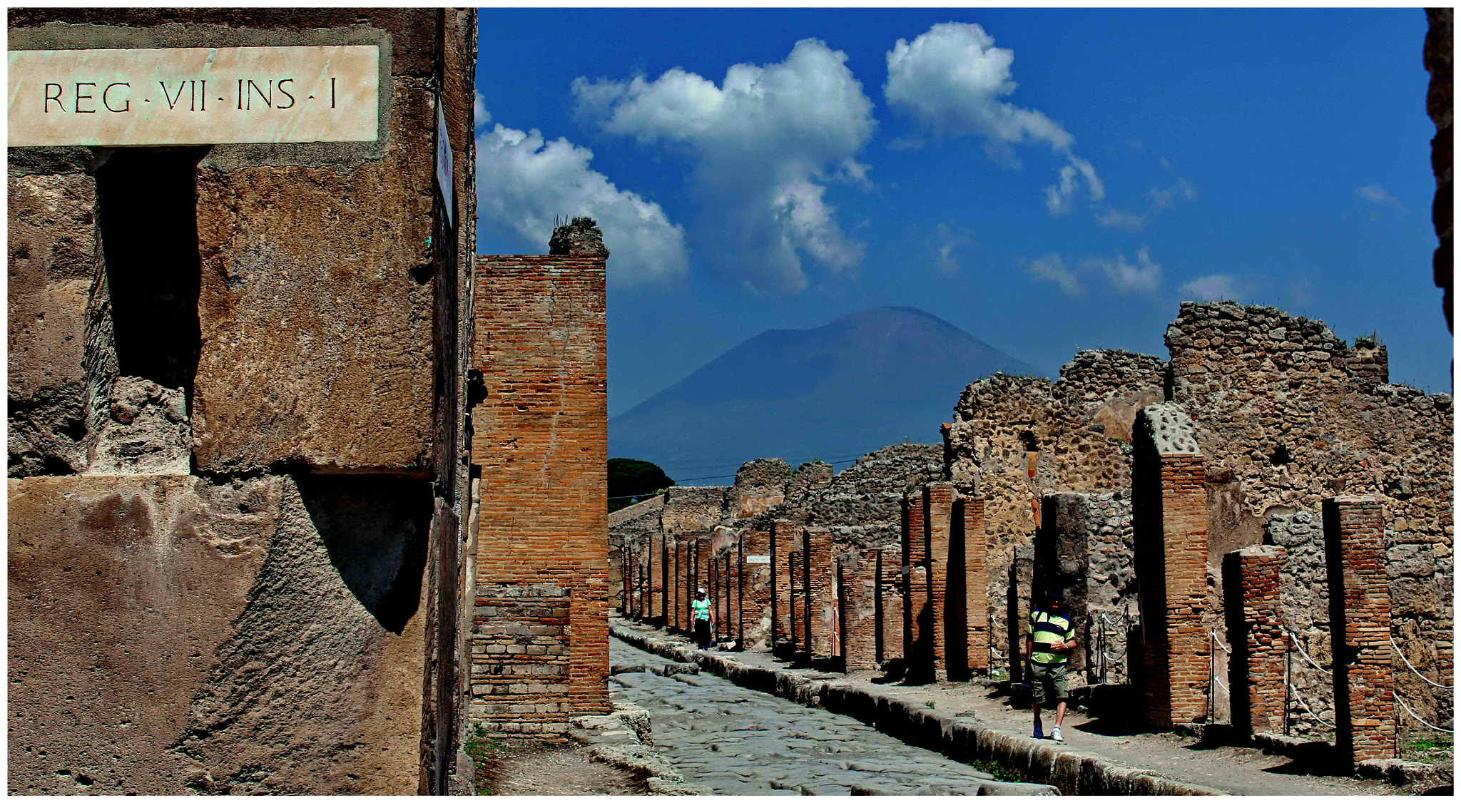 Canon EF-S 18-55mm F3.5-5.6 IS sample photo. Pompeii street with vesuvius ominous photography