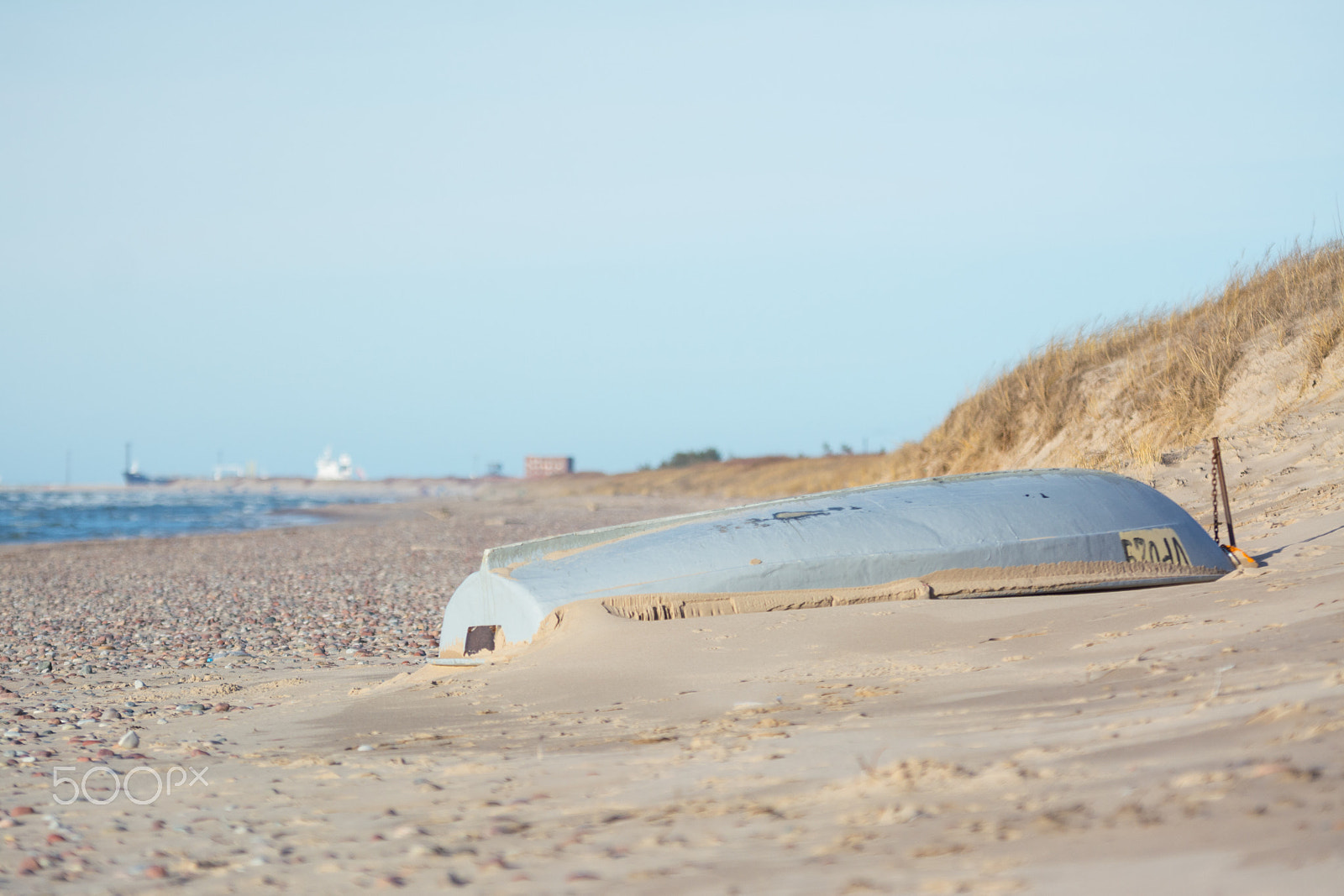 Sigma 70-200mm F2.8 EX DG OS HSM sample photo. Boat on sea shore photography