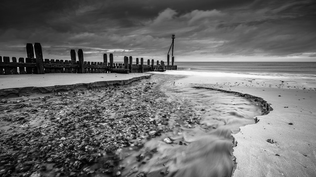 Sony a7 sample photo. Mundesley beach - mono photography