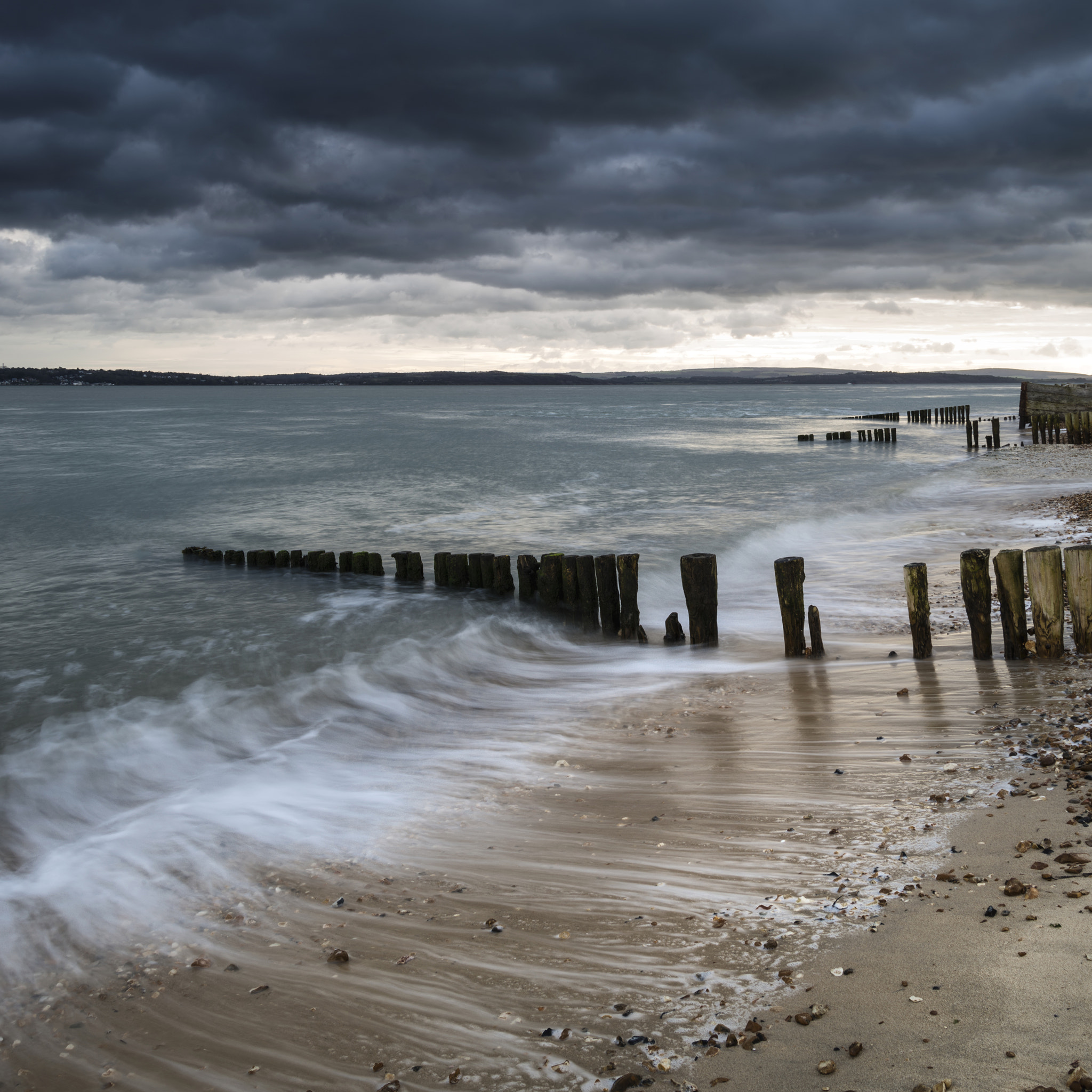 Nikon D800 + Nikon AF-S Nikkor 24-85mm F3.5-4.5G ED VR sample photo. Storm passing over beach landscape with long exposure and vibran photography