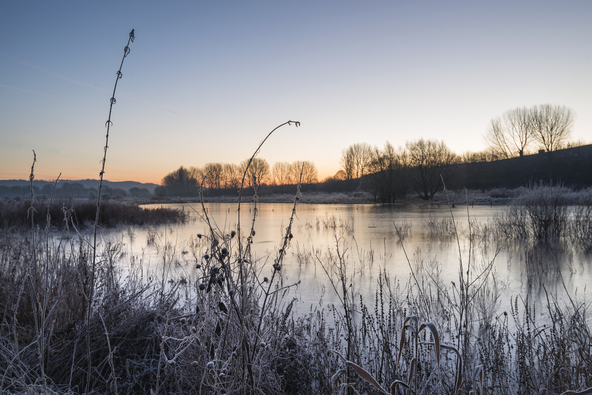 Nikon AF-S Nikkor 18-35mm F3.5-4.5G ED sample photo. Beautiful vibrant english countryside lake image with frost and photography