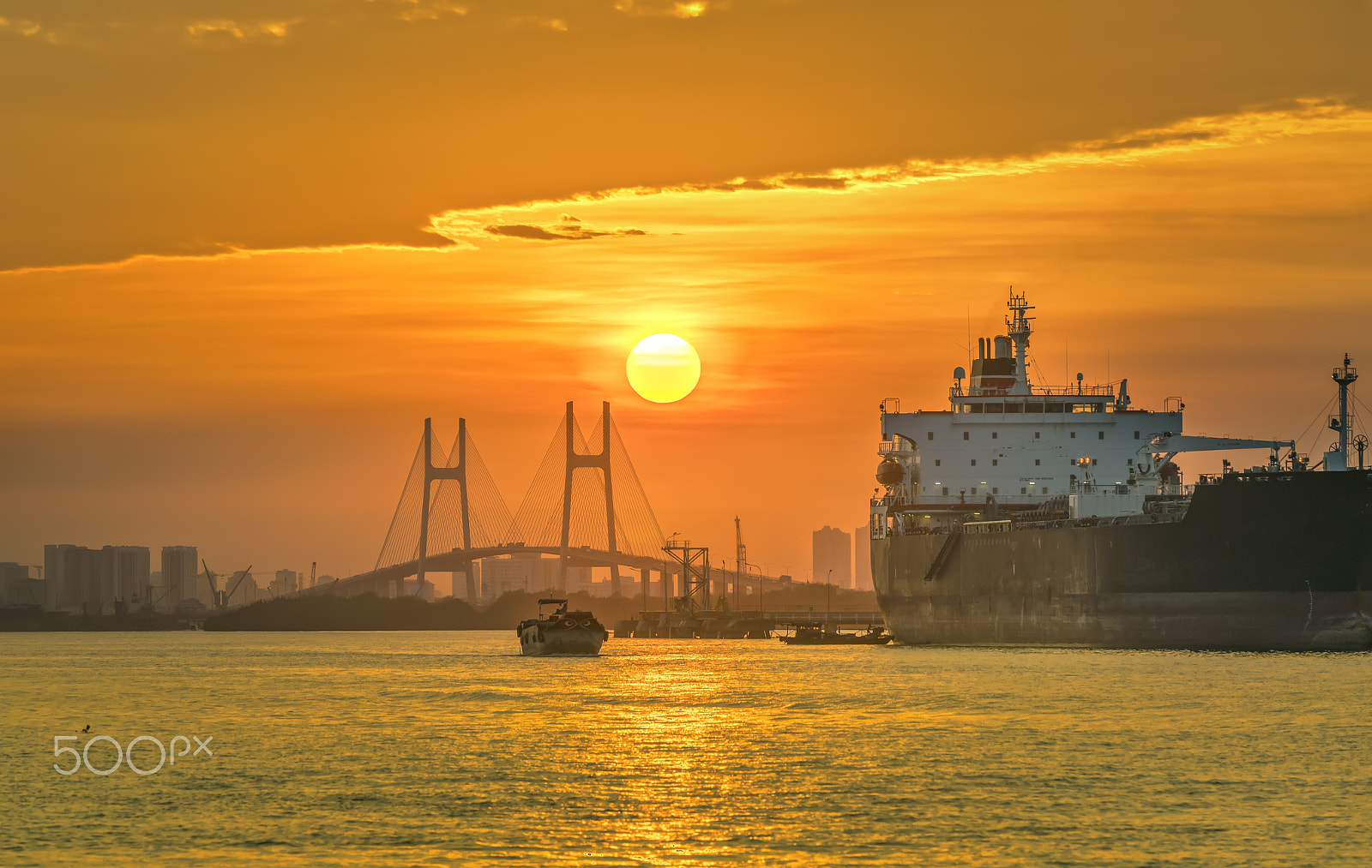 Sony a7R II + Canon EF 70-200mm F4L IS USM sample photo. Beautiful colorful sunset at the phu my bridge photography