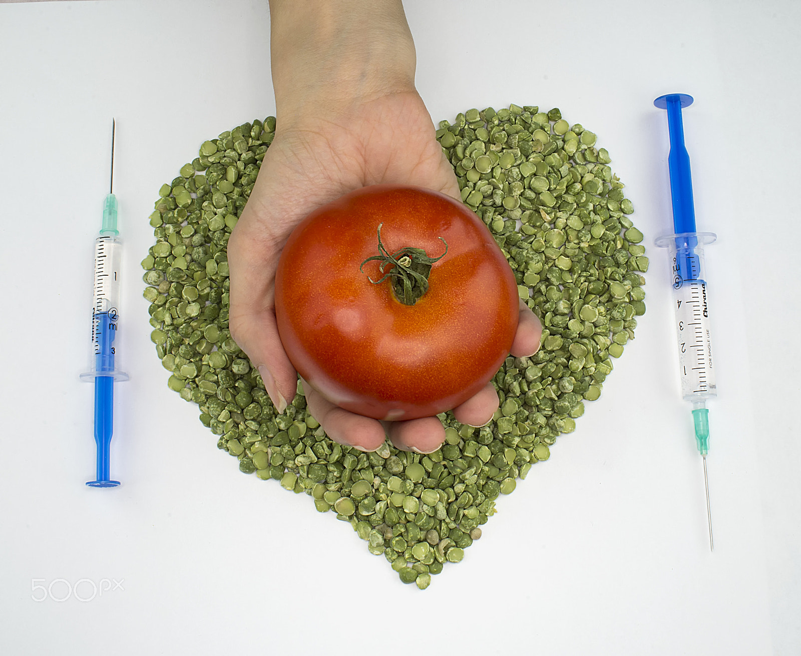 Nikon D610 sample photo. Green peas red tomato syringes photography