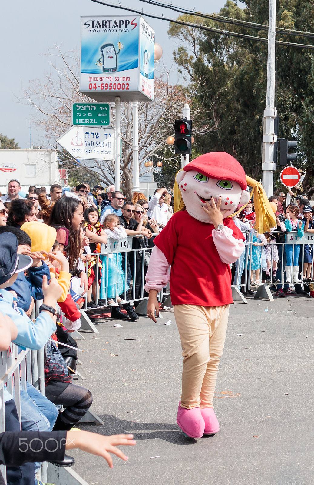 Canon EF 75-300mm F4.0-5.6 IS USM sample photo. Participant in carnival dressed as big rabbit goes near viewers photography