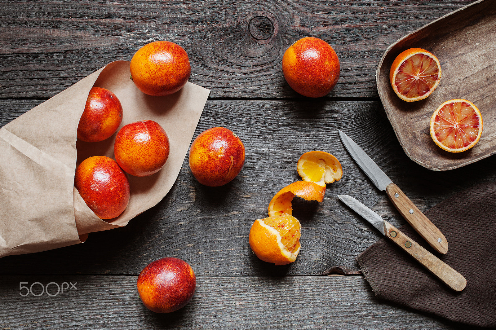 Nikon D700 sample photo. Red oranges on the wooden table photography